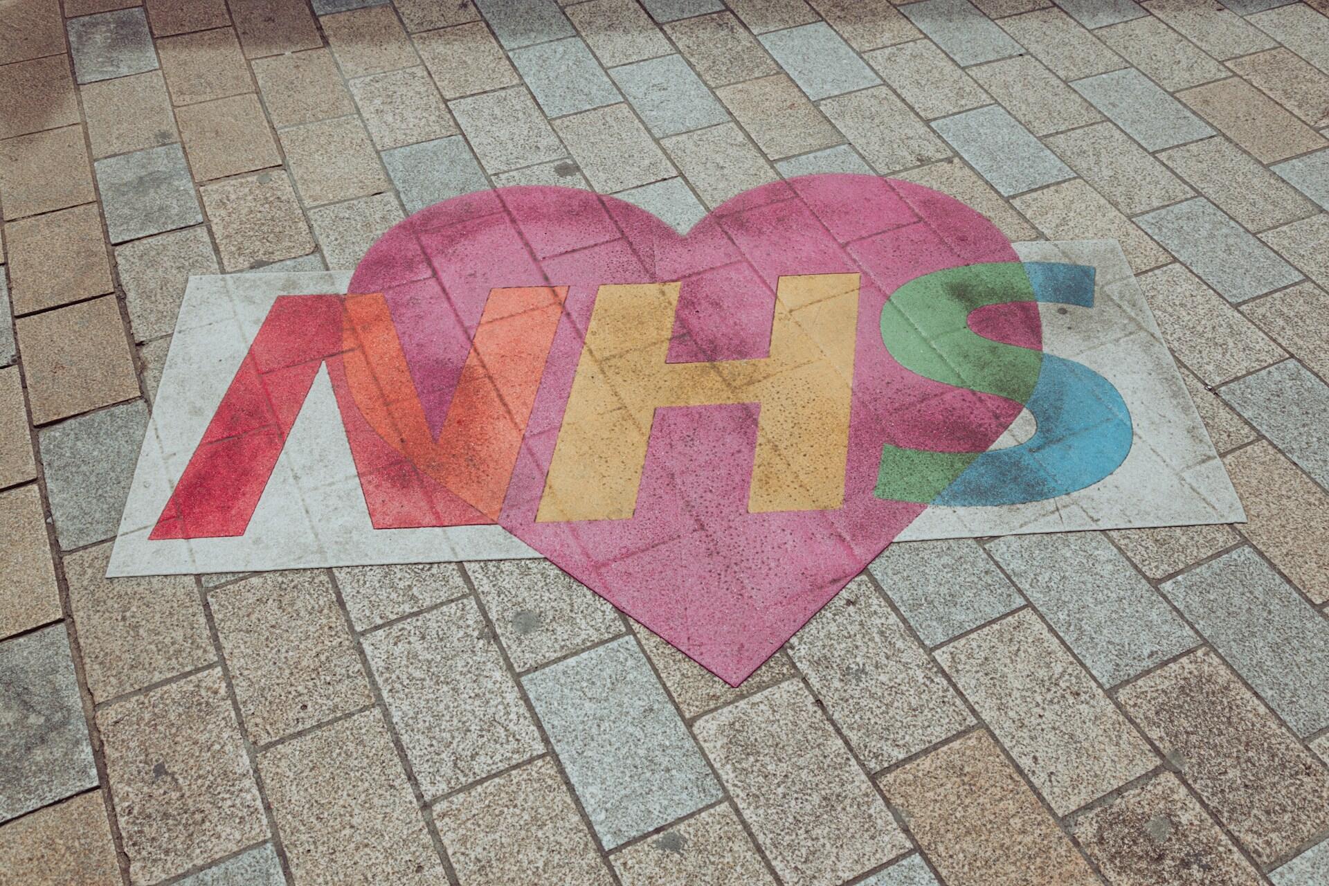 An NHS heart sign.