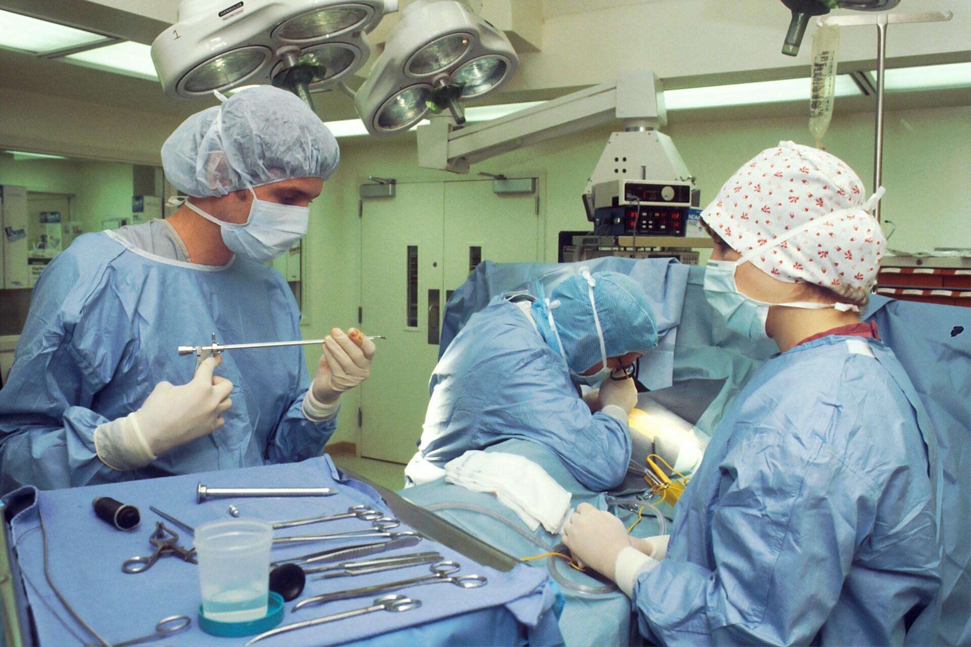 Surgeons operating.