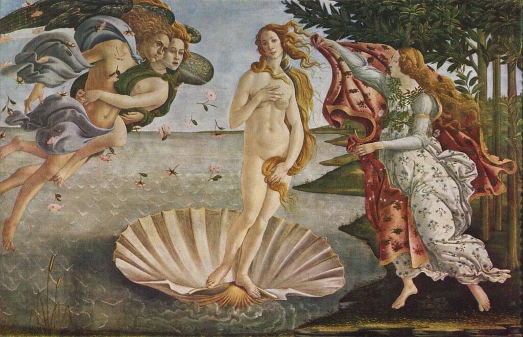 A woman stands on a seashell in the ocean, with flowing hair and a serene expression. Winged figures blow wind from the left, while a woman on the right offers a cloak.