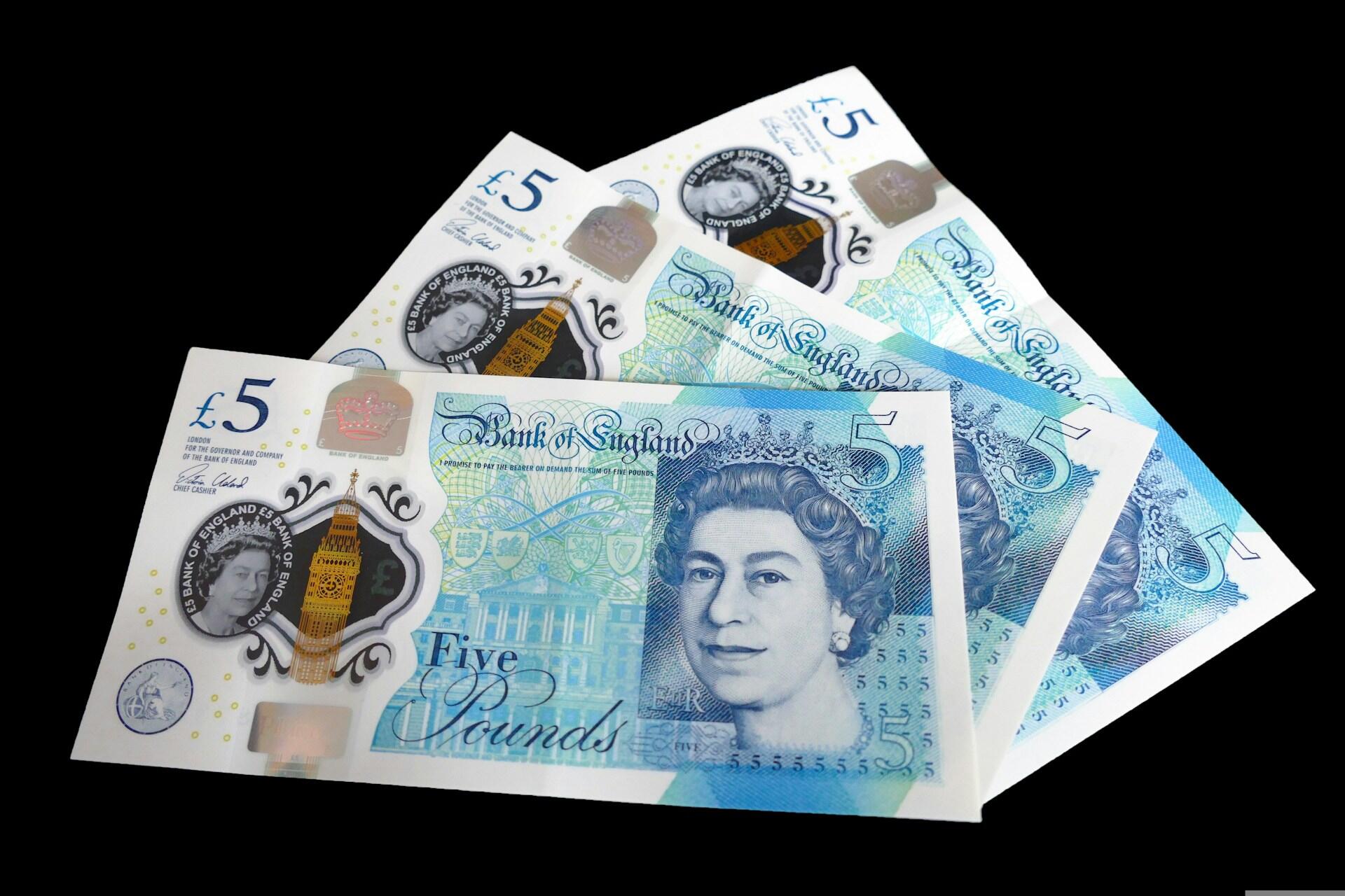 Some £5 notes.
