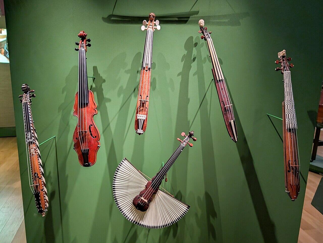 a selection of Kit violins in a museum
