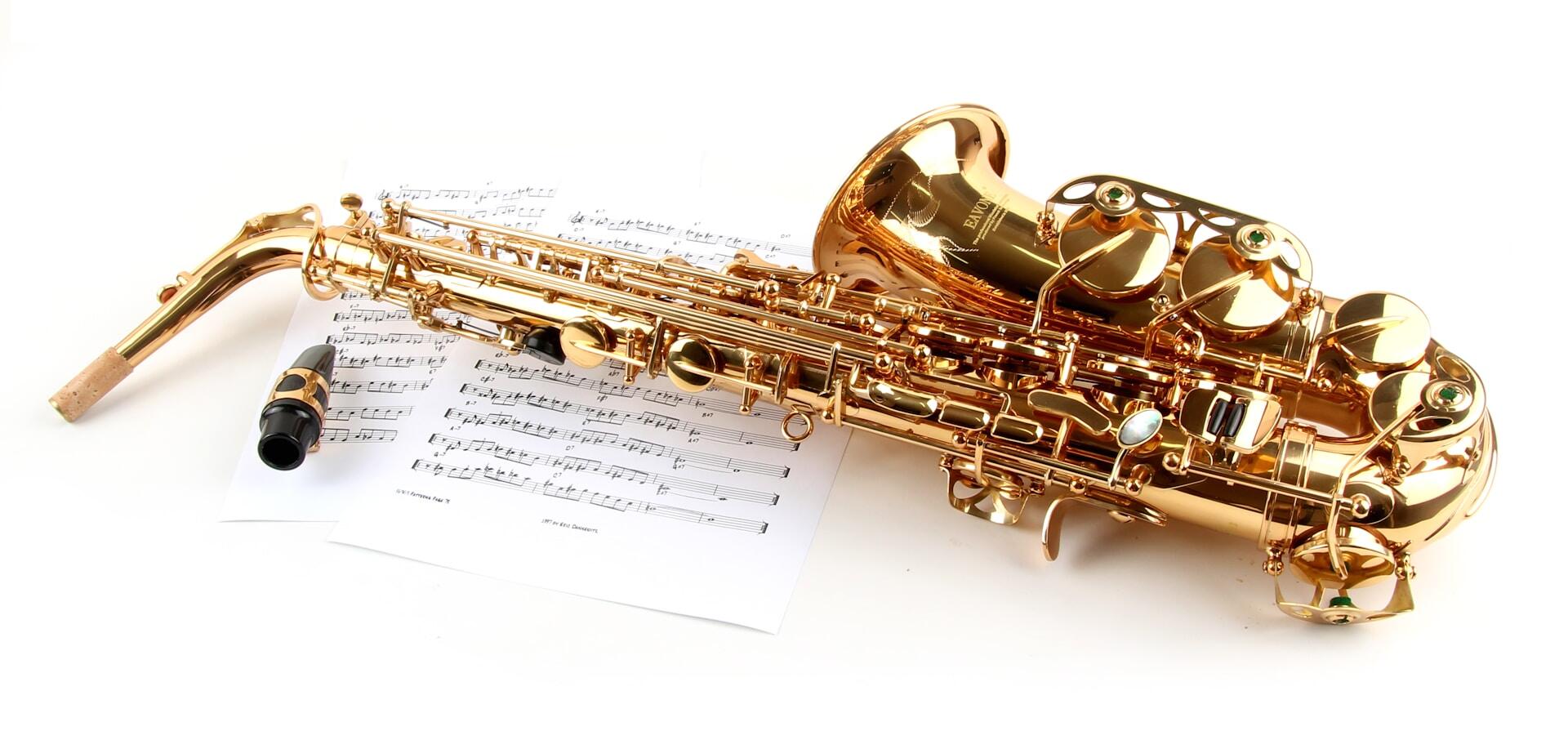 A saxophone with its mouthpiece detached.