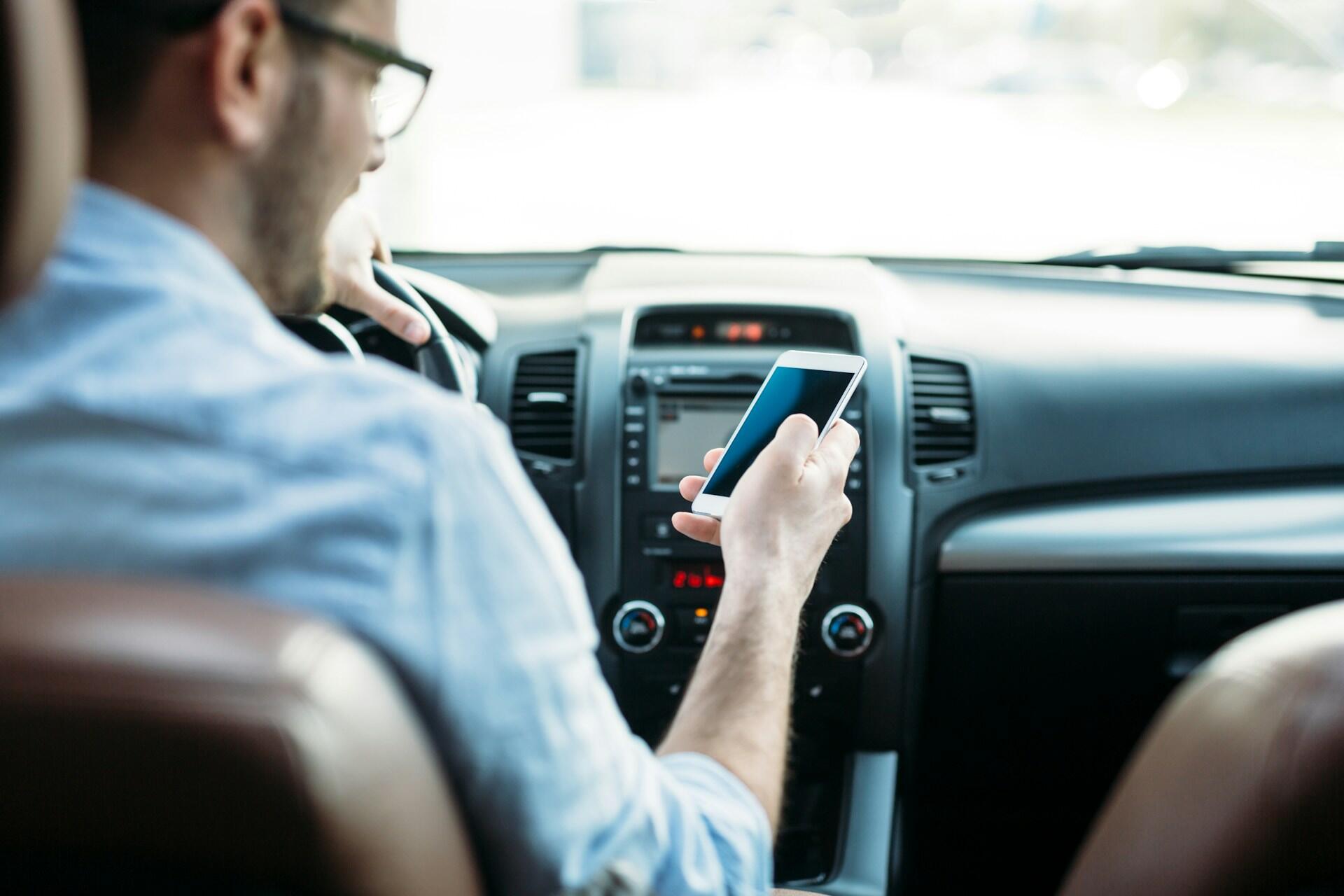 driver using phone while driving