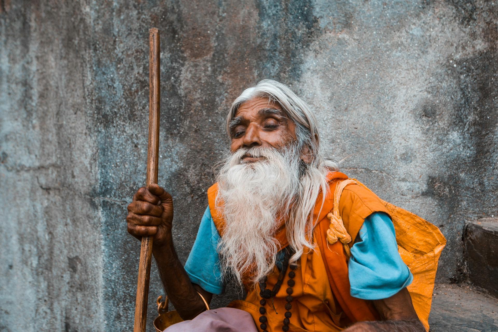 wise old man dressed in traditional clothing