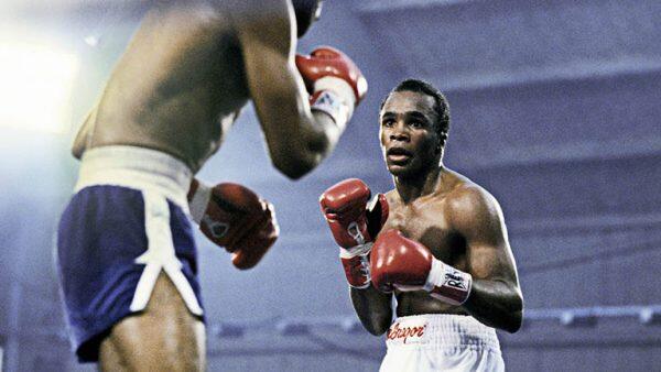 A boxing match between Leonard and an opponent.