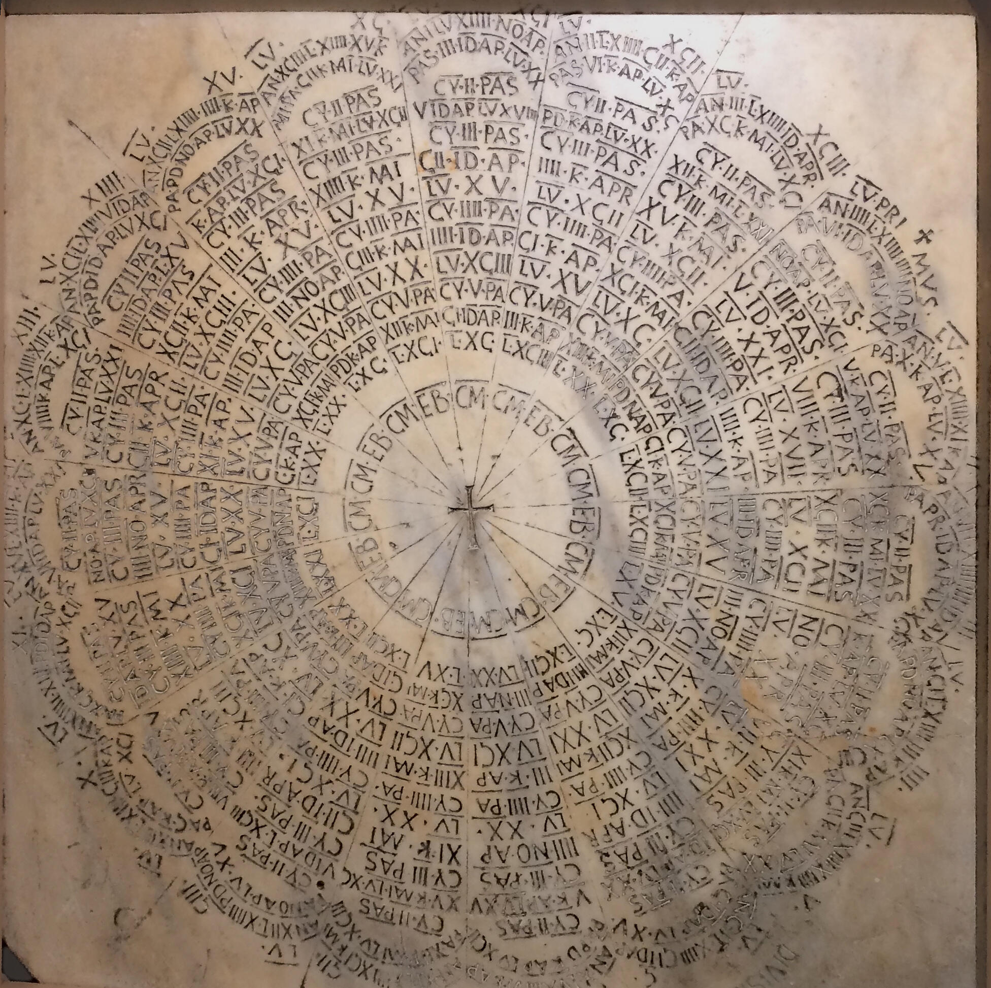 carved tablet depicting a very complicated circular calendar from 532-626 CE