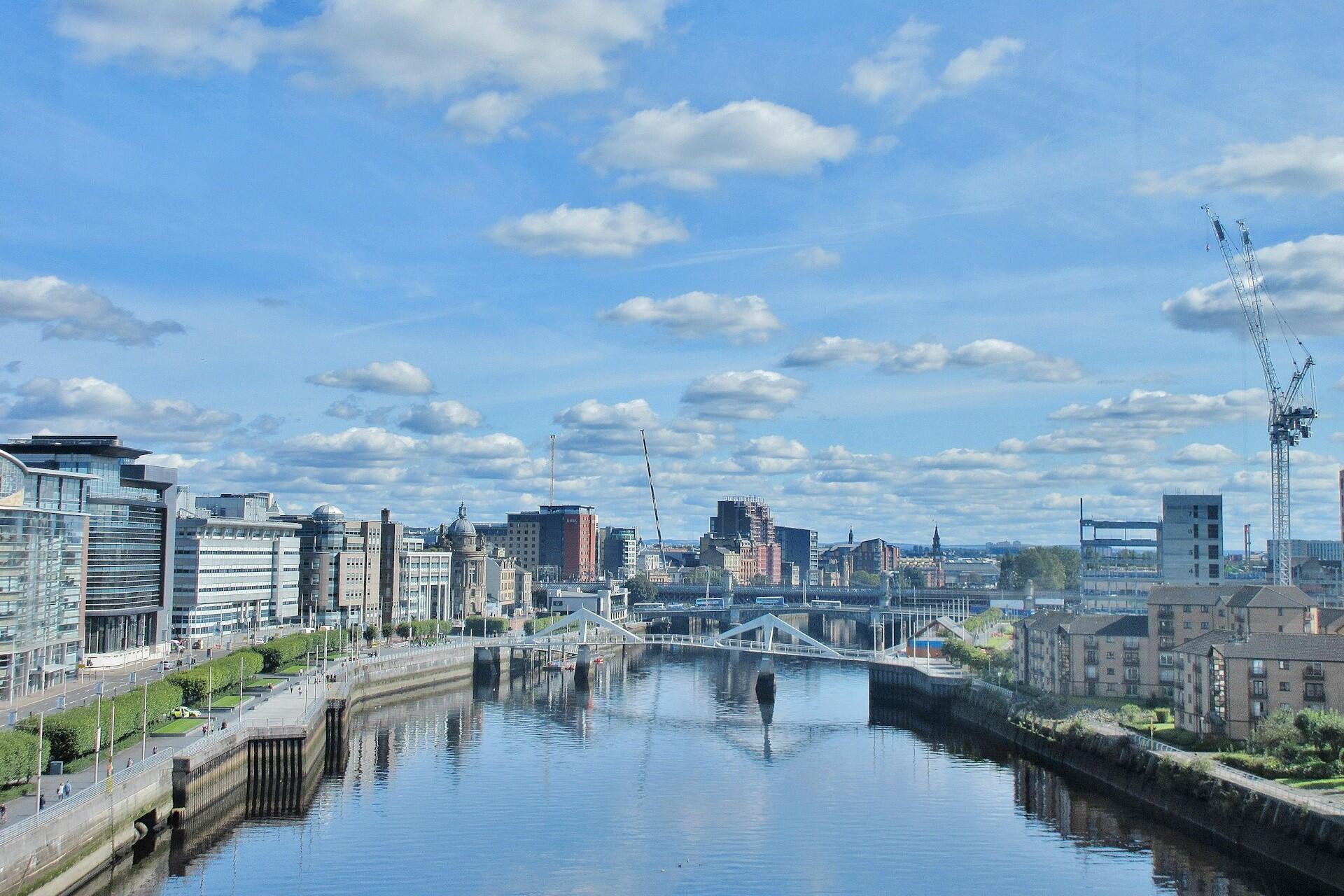 View of Glasgow skyline and River Clyde with modern buildings and bridges