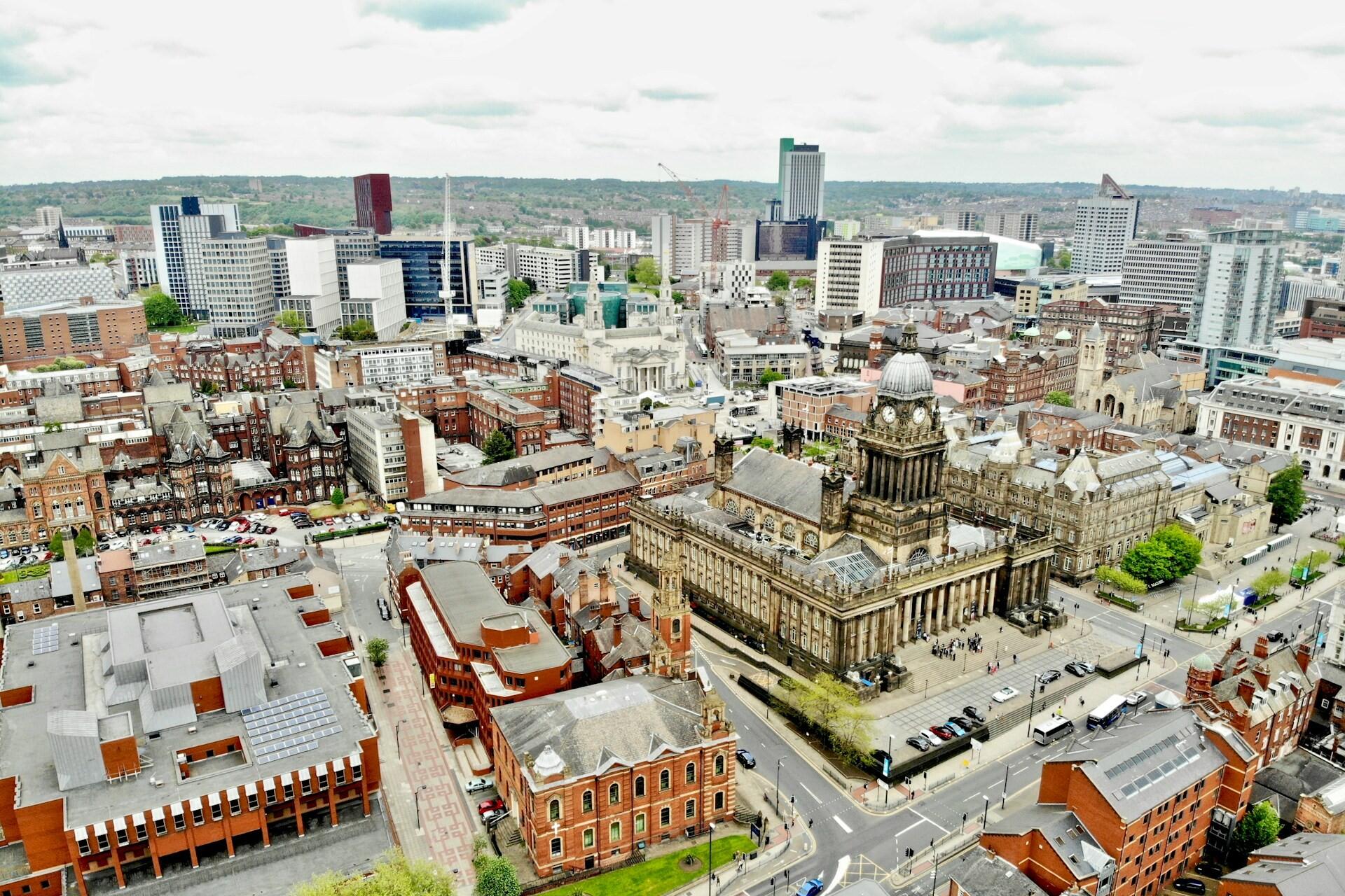 Aerial view of Leeds city centre showing Leeds Town Hall and surrounding buildings