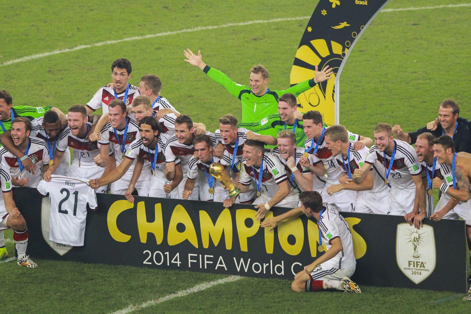 Germany national team celebrating with the FIFA World Cup trophy after winning the 2014 final.