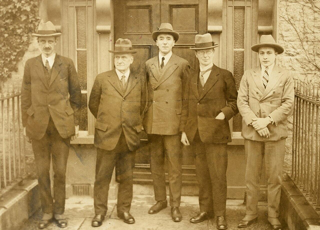 Sepia image of men dressed in suits
