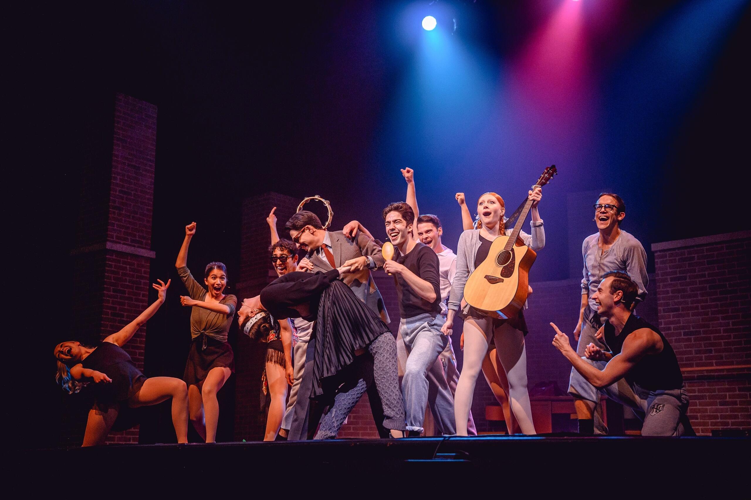Actors performing a musical number in the musical