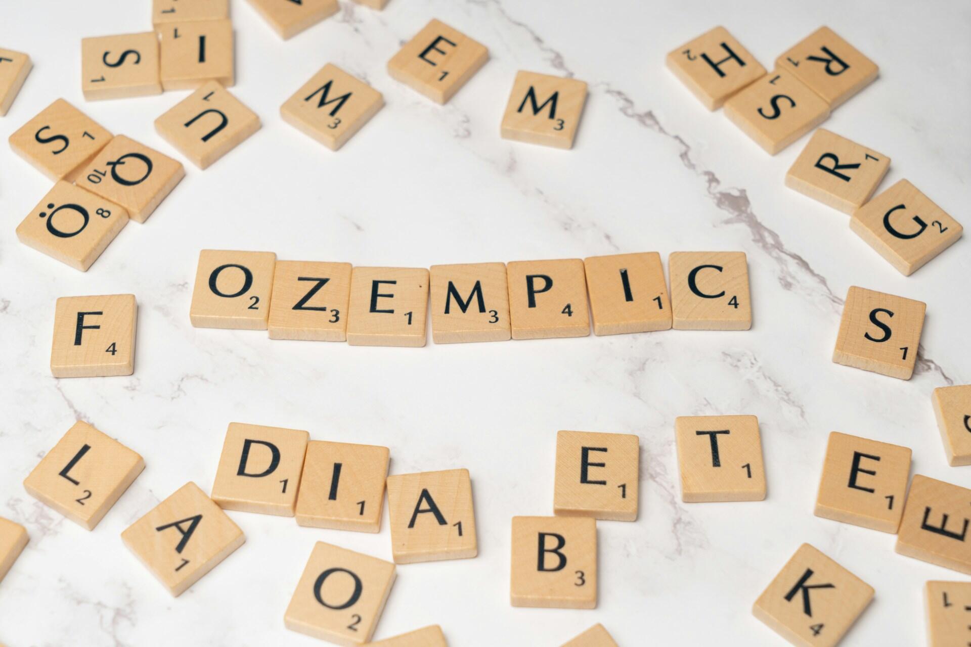Wooden Scrabble tiles spelling