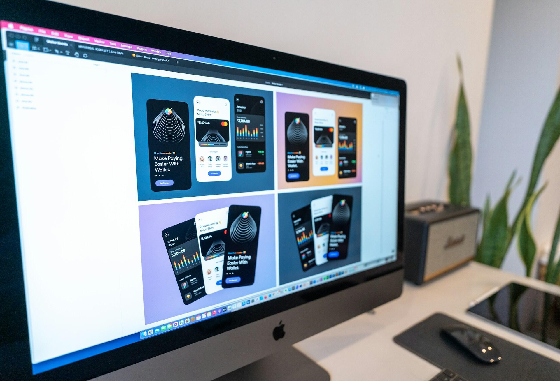Digital interface designs displayed on a desktop screen in UI design software