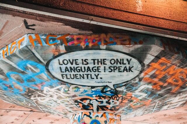 a mural with a writing that says
