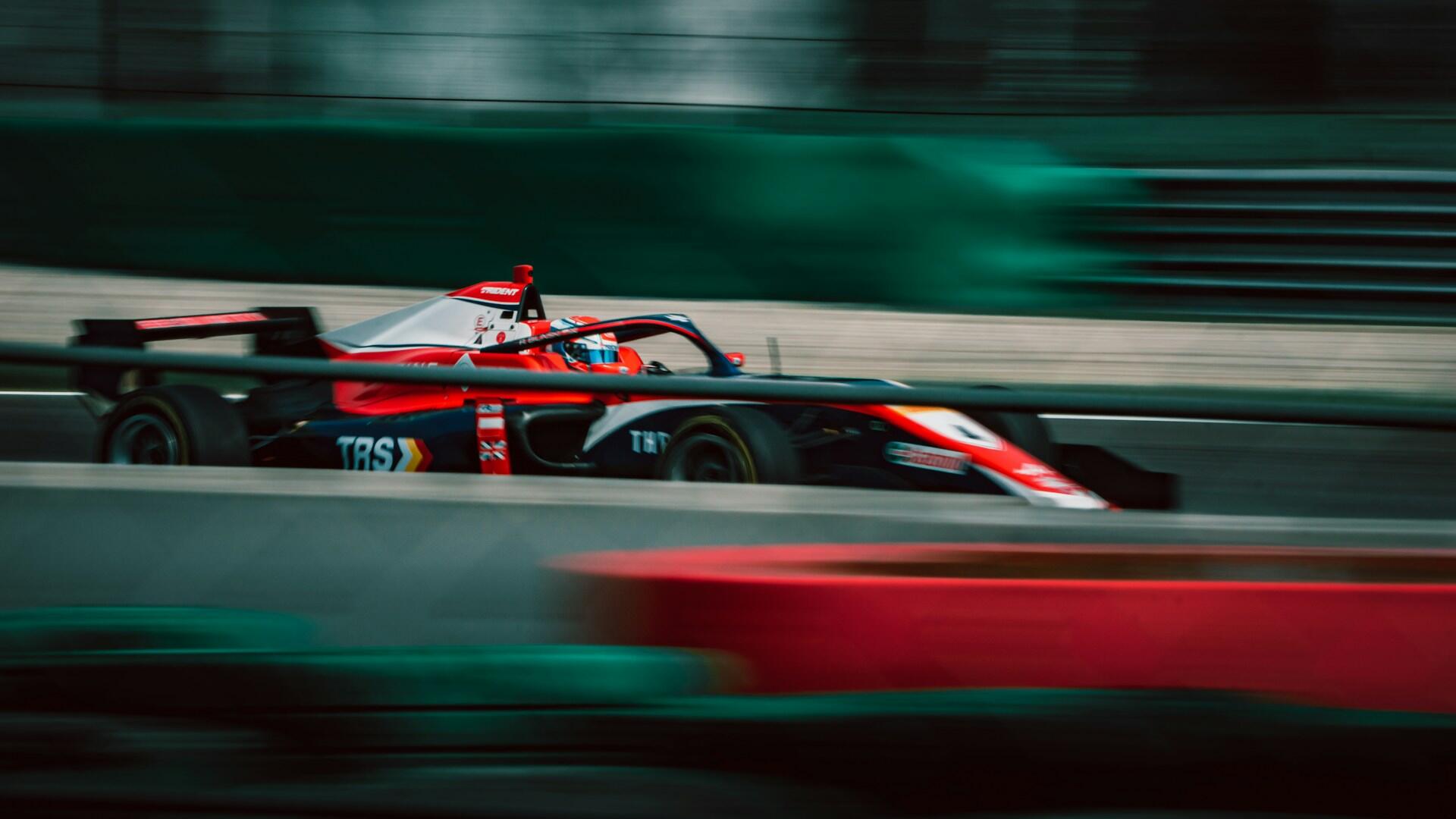red racing car on a racing track