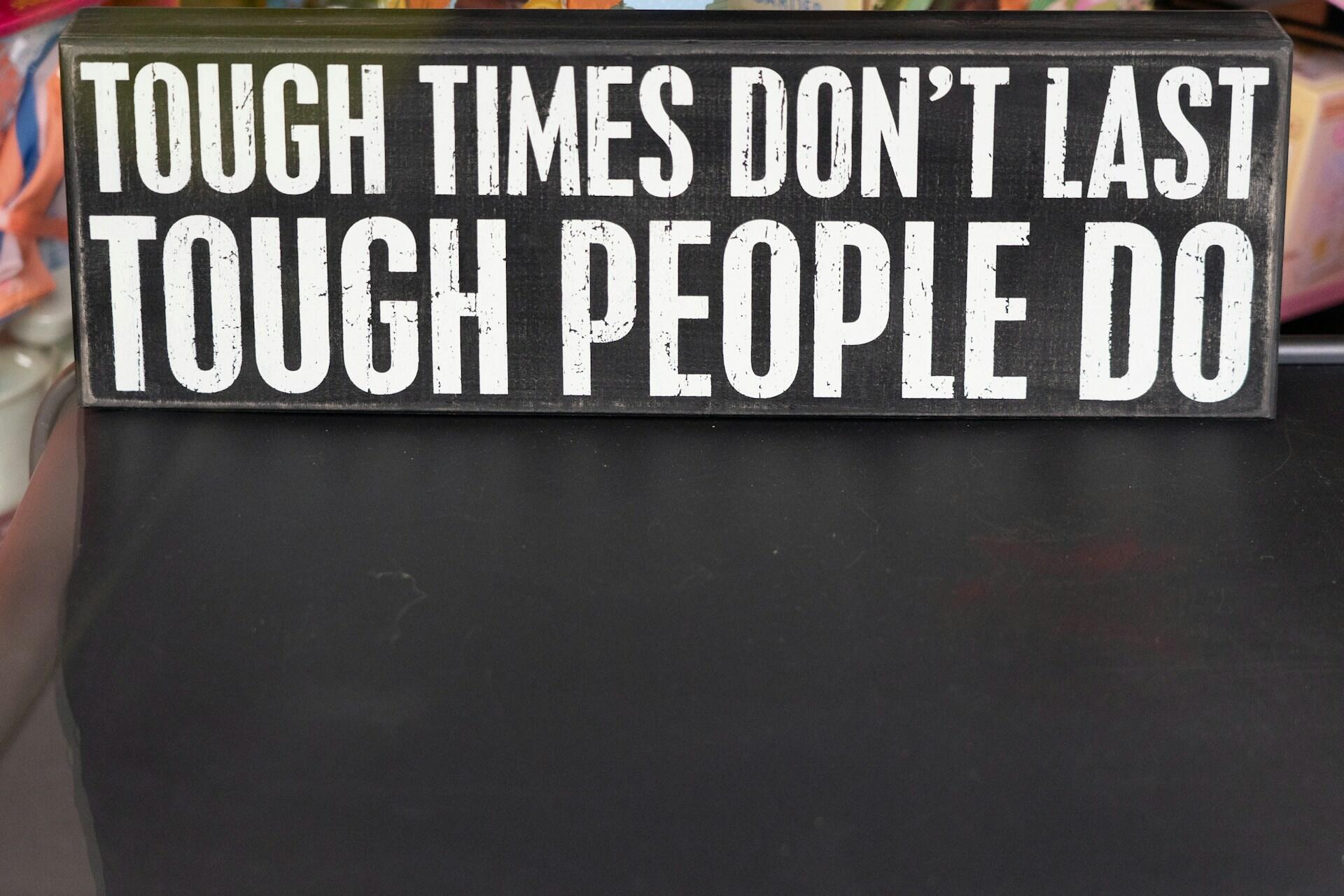An inspirational sign with the message,