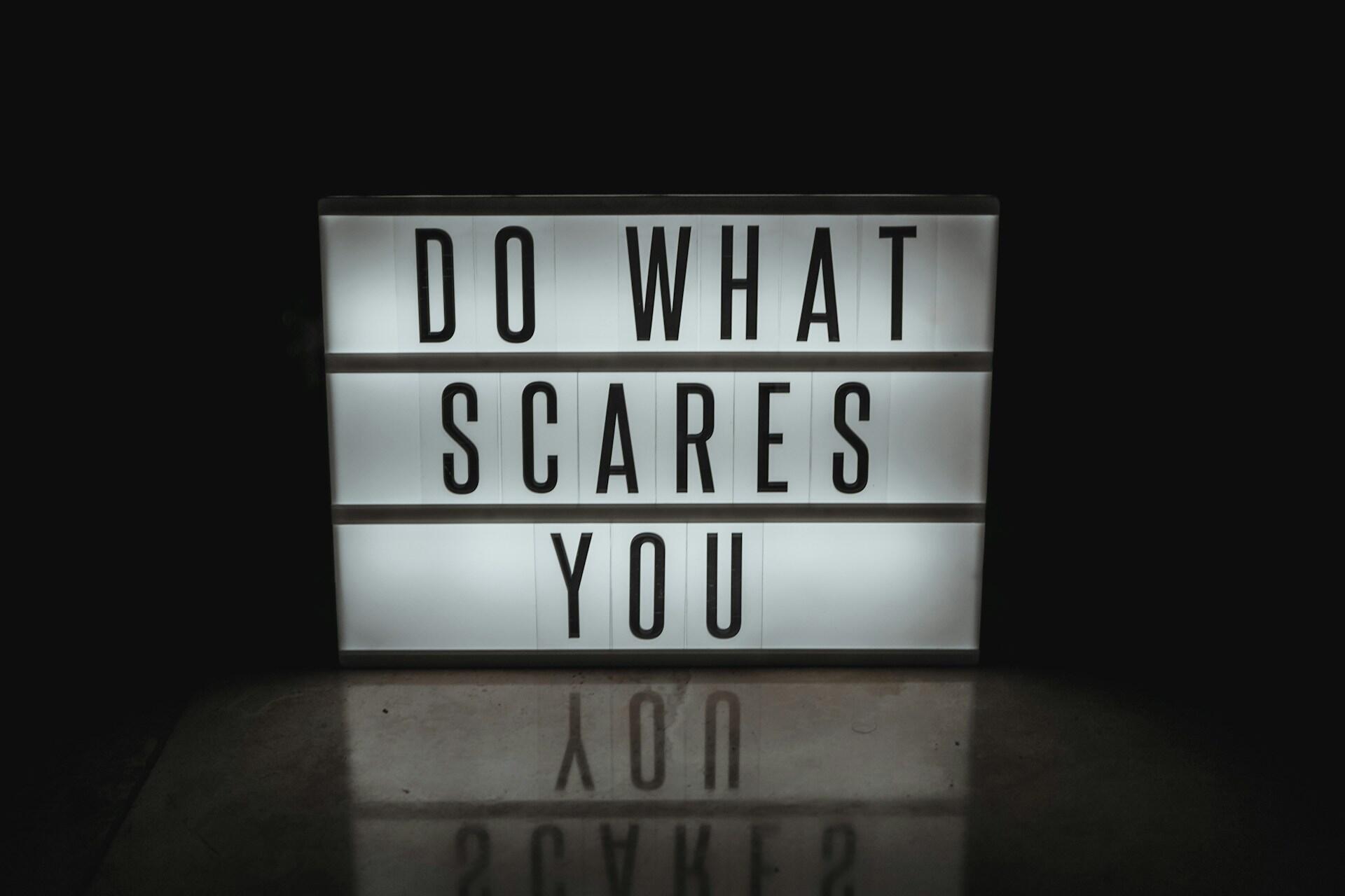 A light box featuring a motivational message in black letters against a white background.