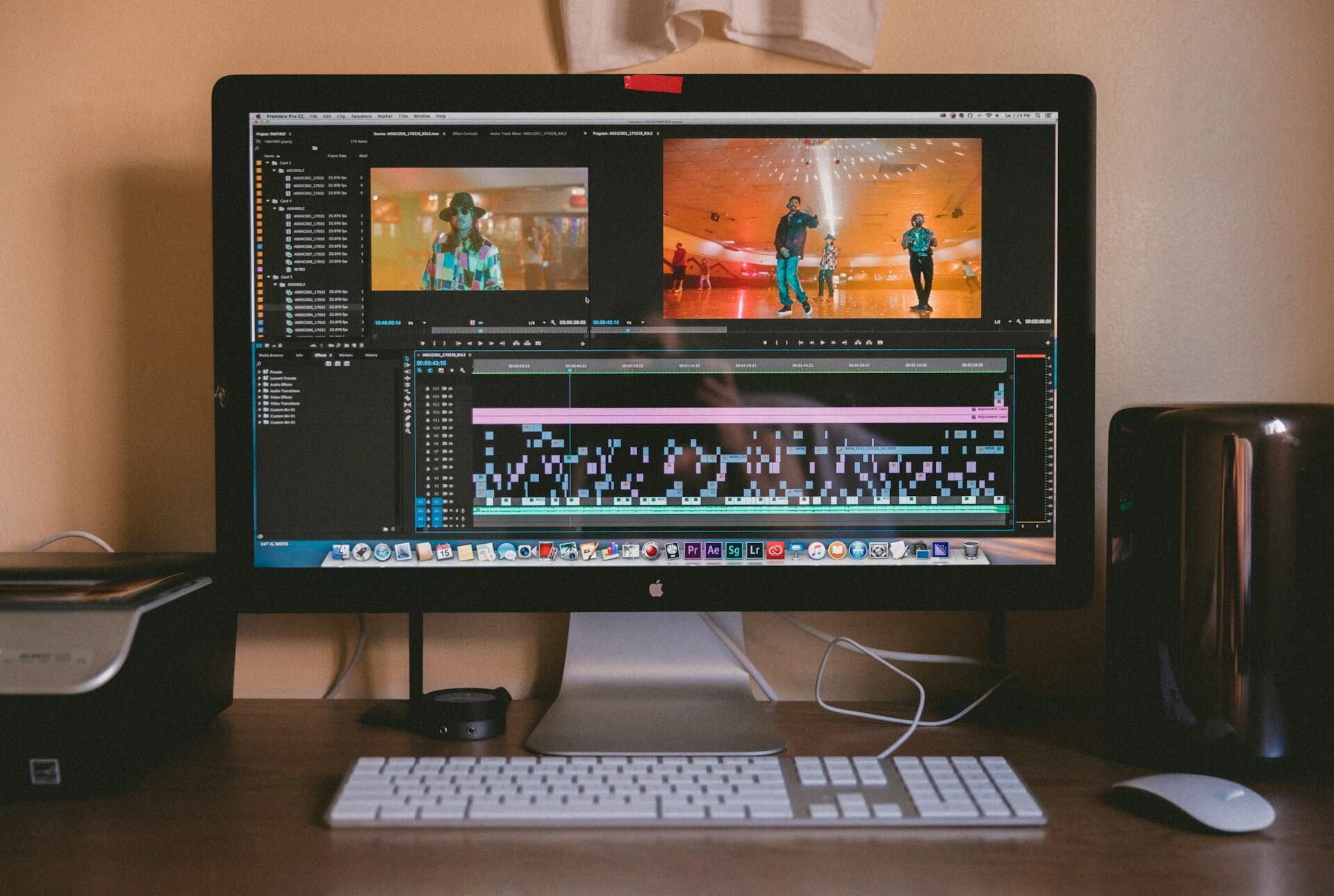 computer showing a video and audio editing software with many small audio details on the timeline