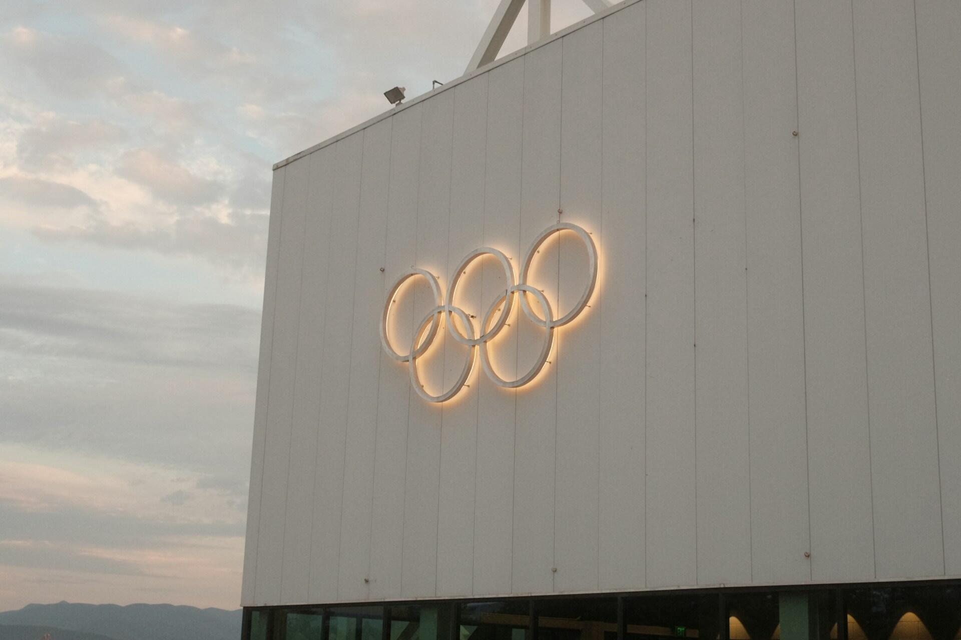 Olympic logo on a building.