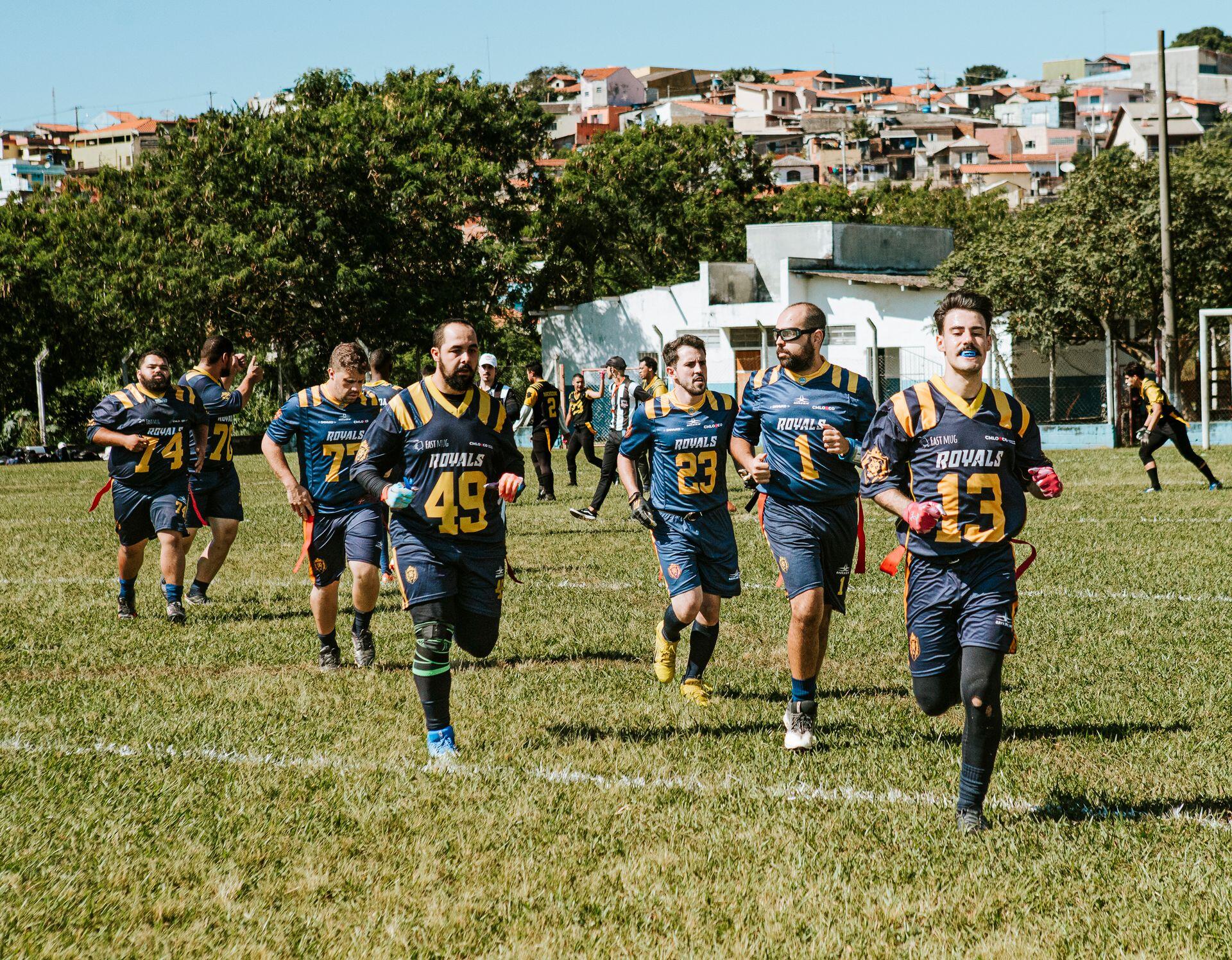 Men's team flag football practice shot.