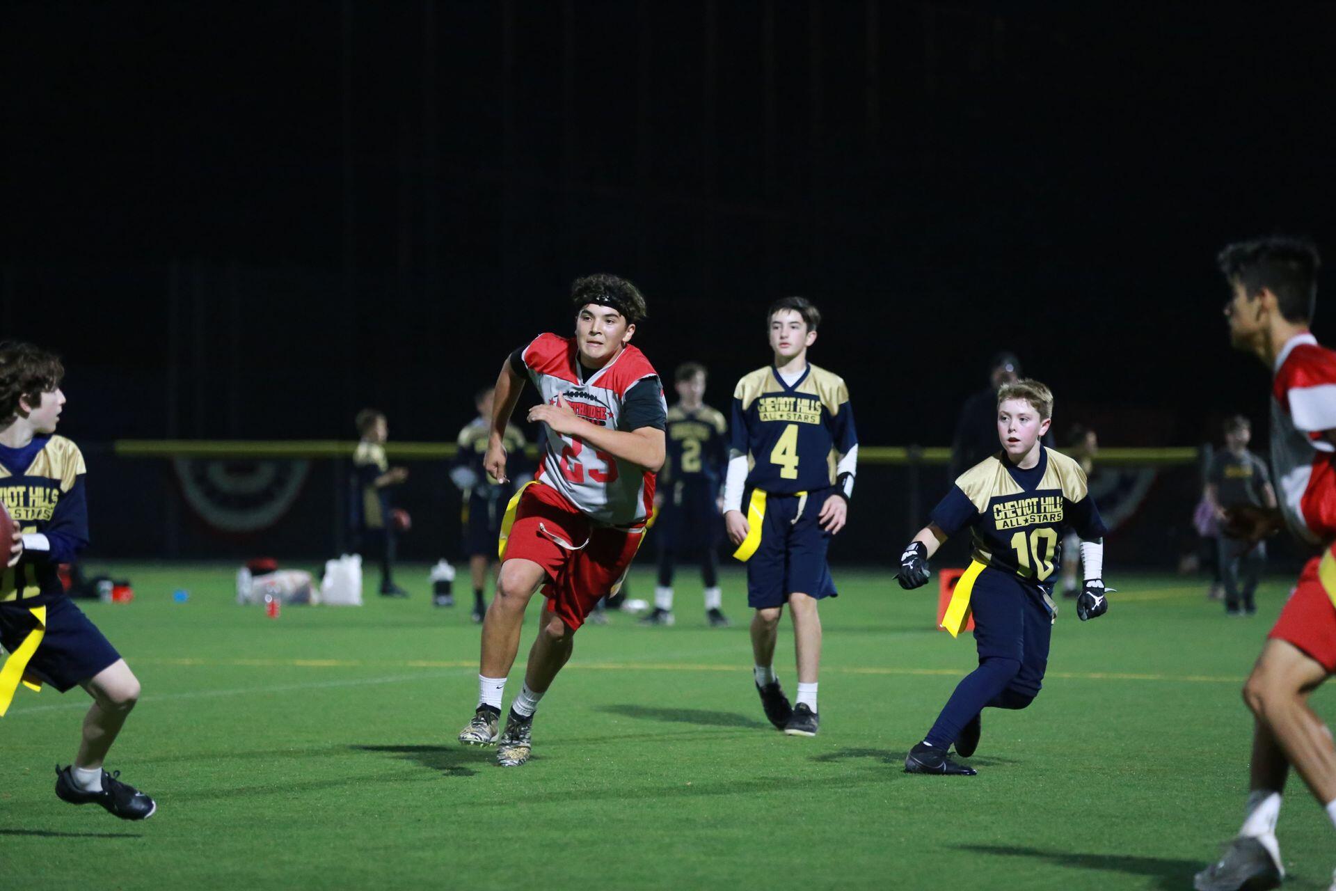 Young athletes playing flag football.