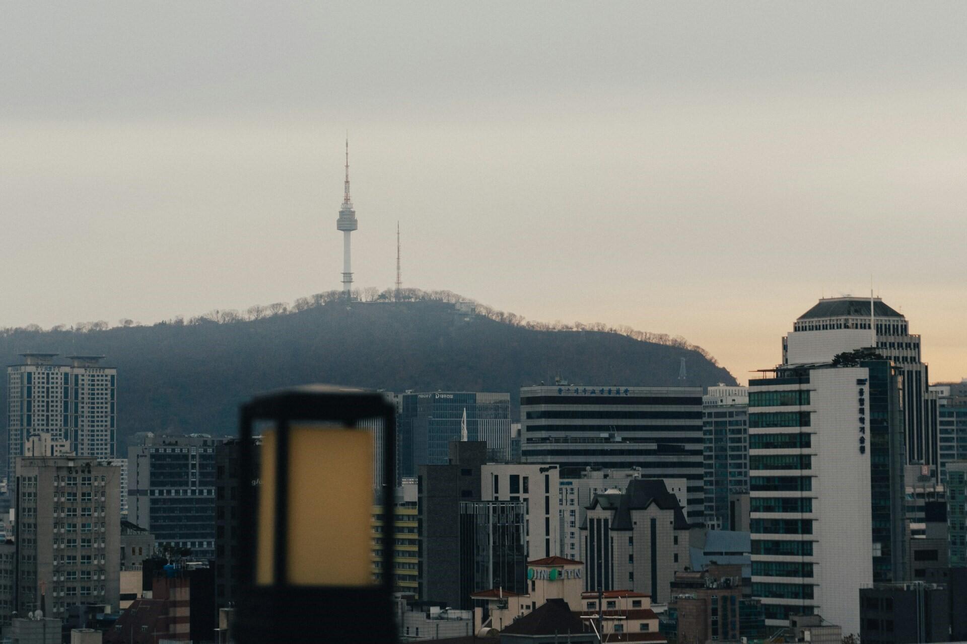 Seoul city skyline with N Seoul Tower on the hillside