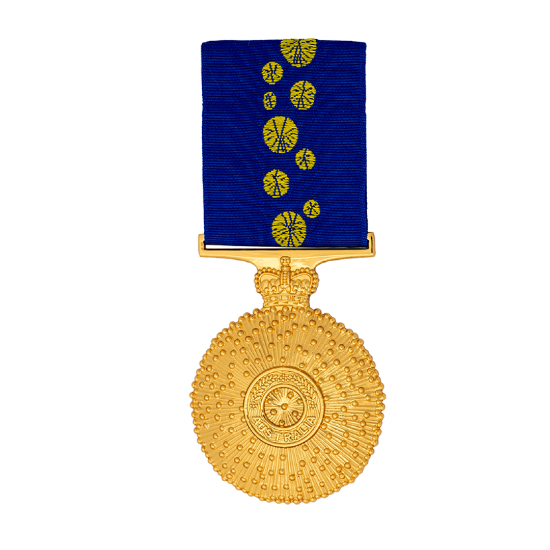A gold circular medal with a crown-shaped connector hangs from a blue ribbon patterned with gold emblems; “AUSTRALIA” is engraved around its center.