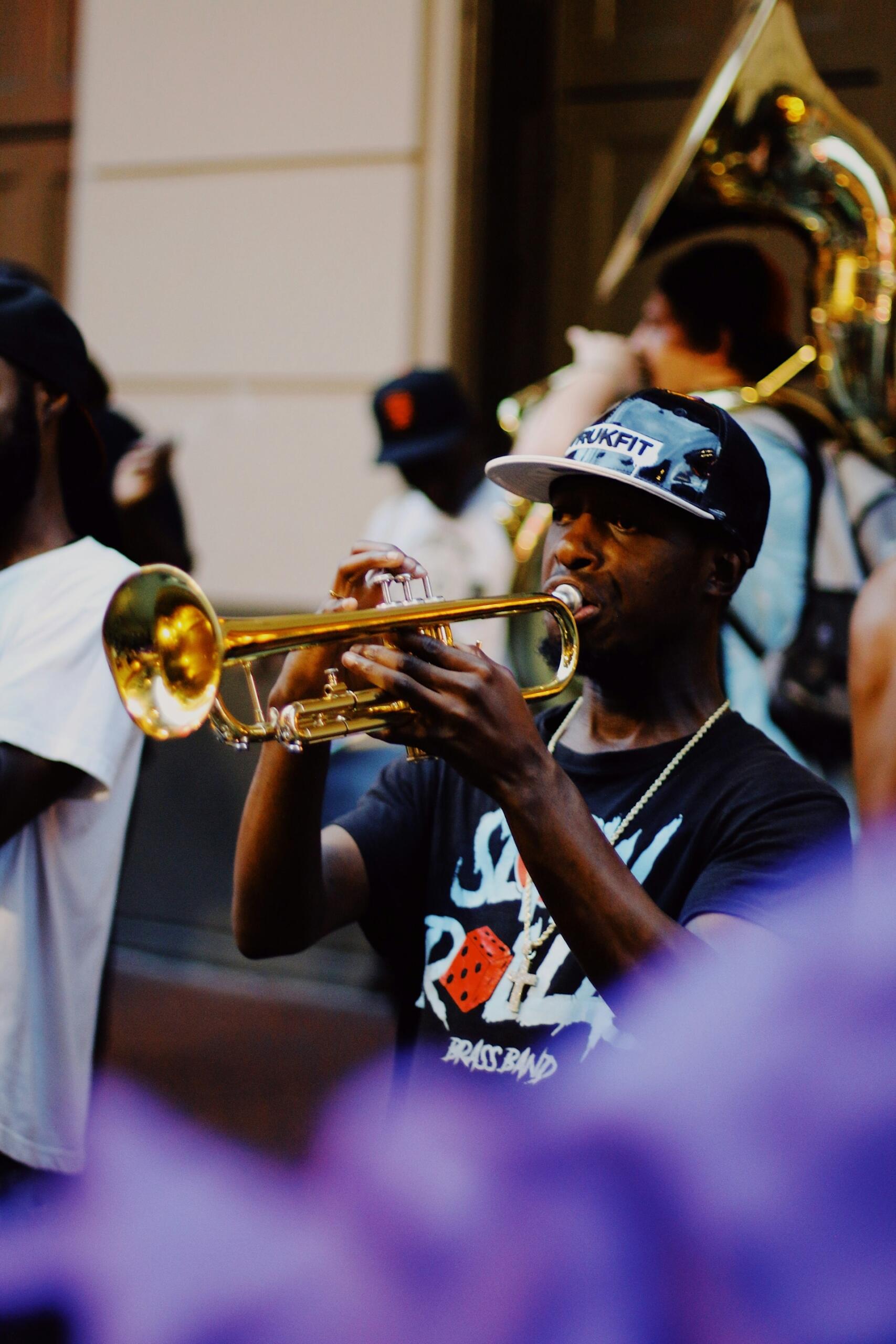 trumpet player in an outdoor setting