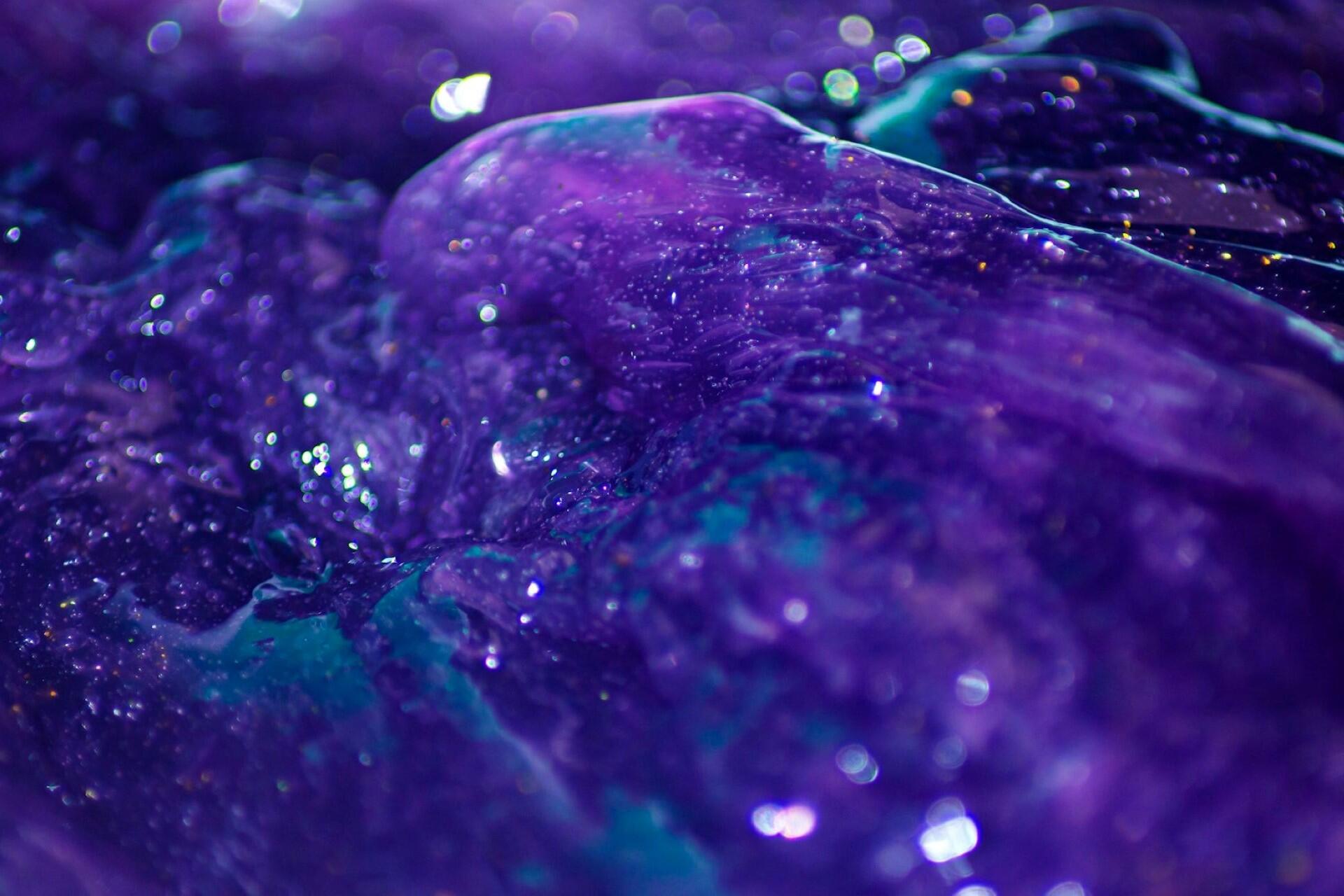 Close-up of purple slime with bubbles and glossy texture