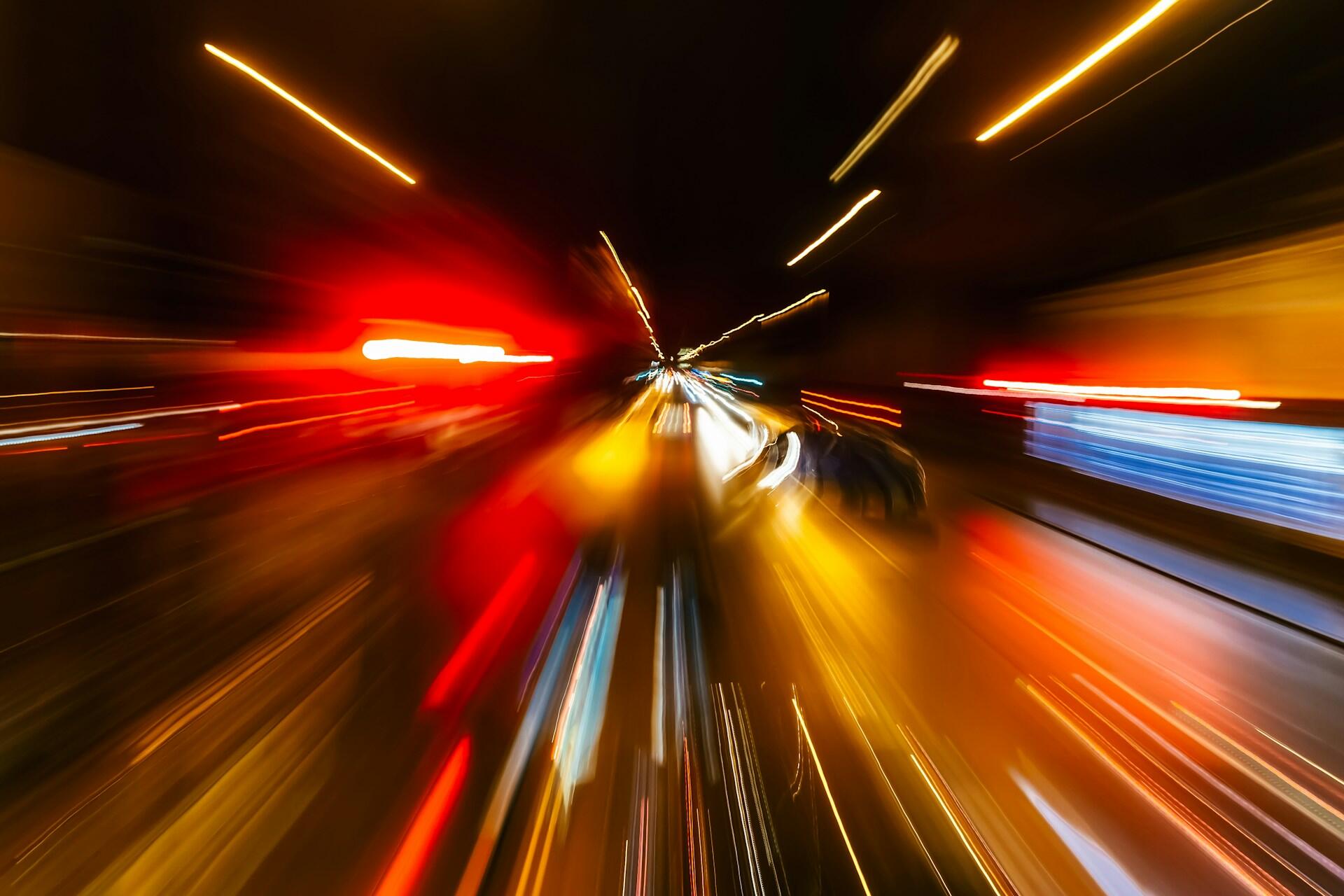Blurred light trails showing motion and speed