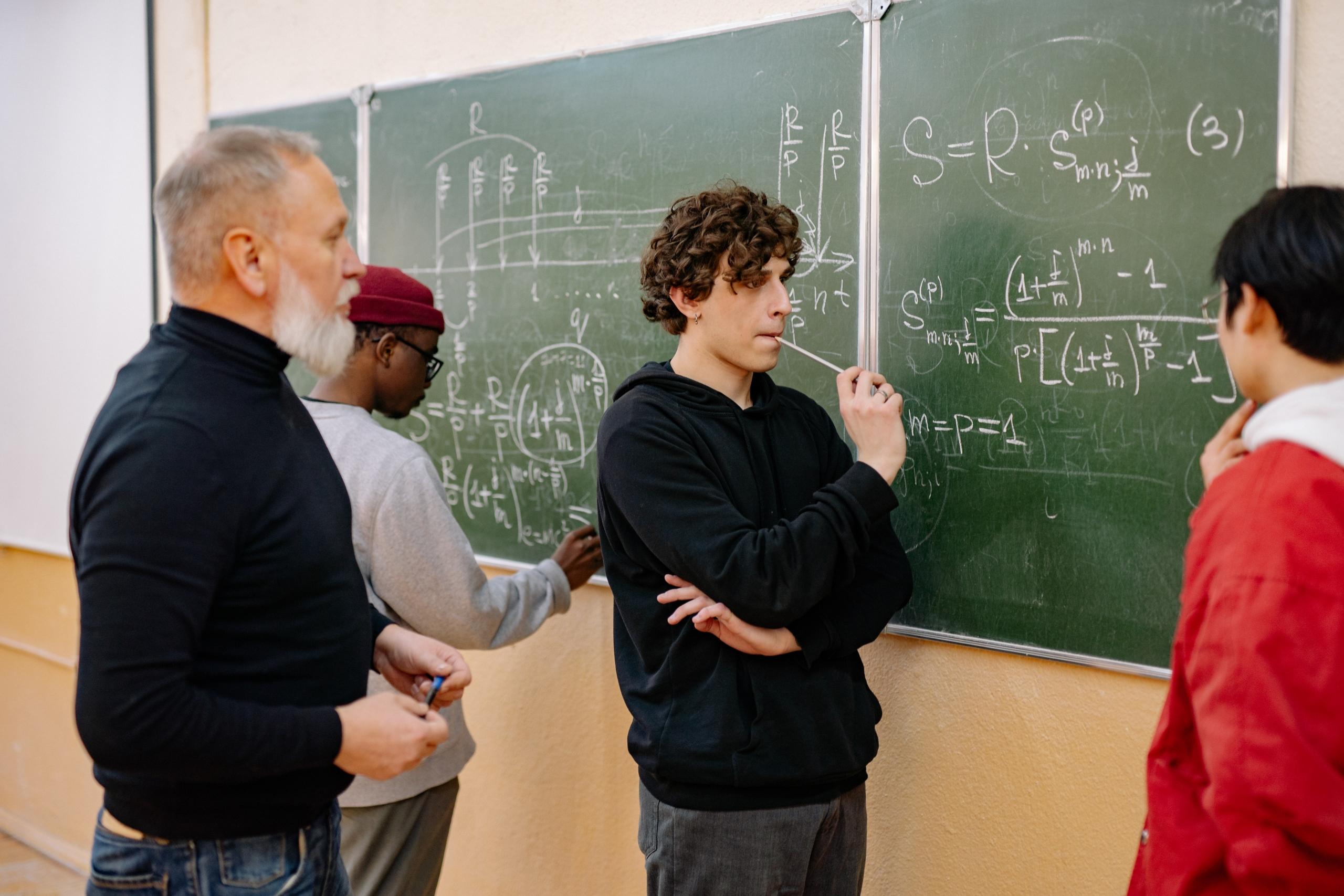A collaborative maths class solving equations.