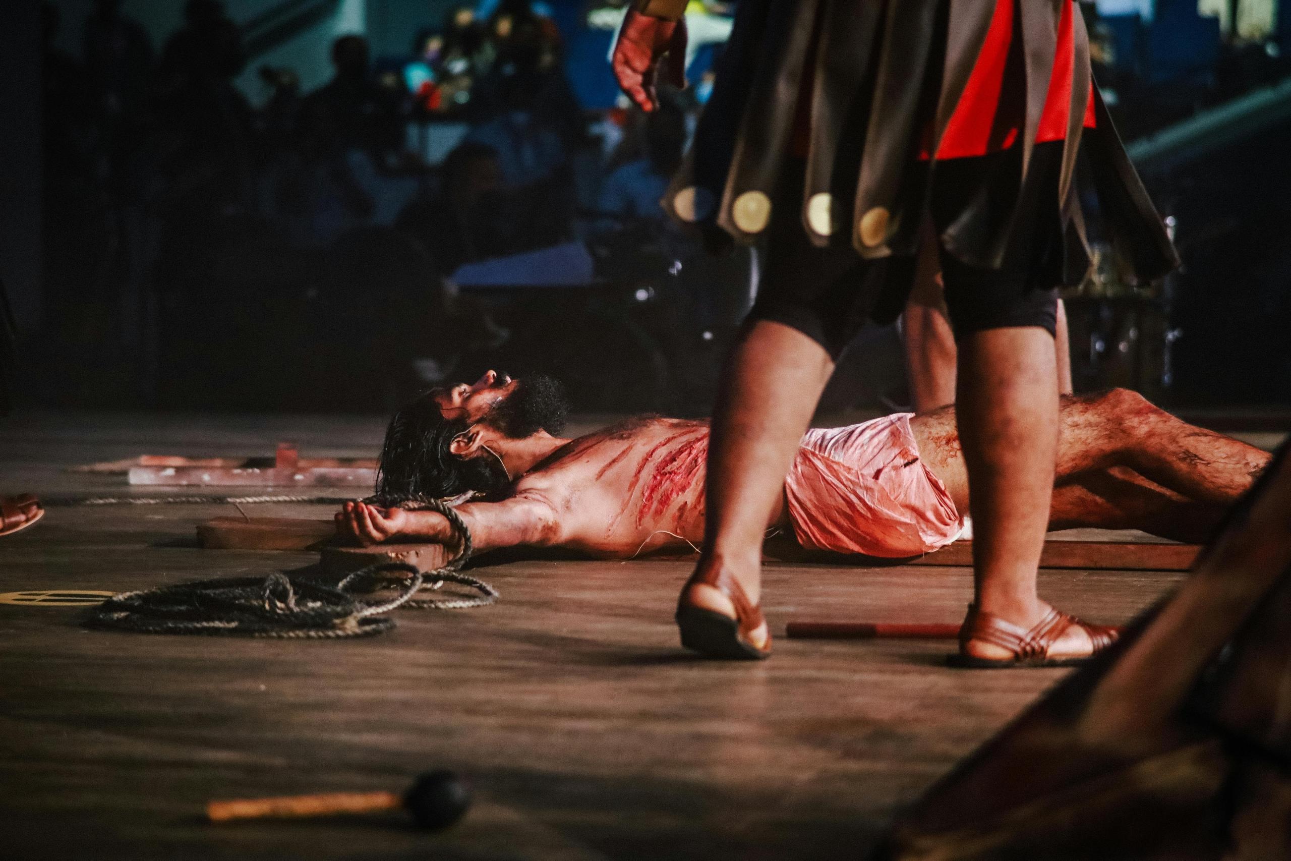 A student playing the role of Jesus in a secondary school play.