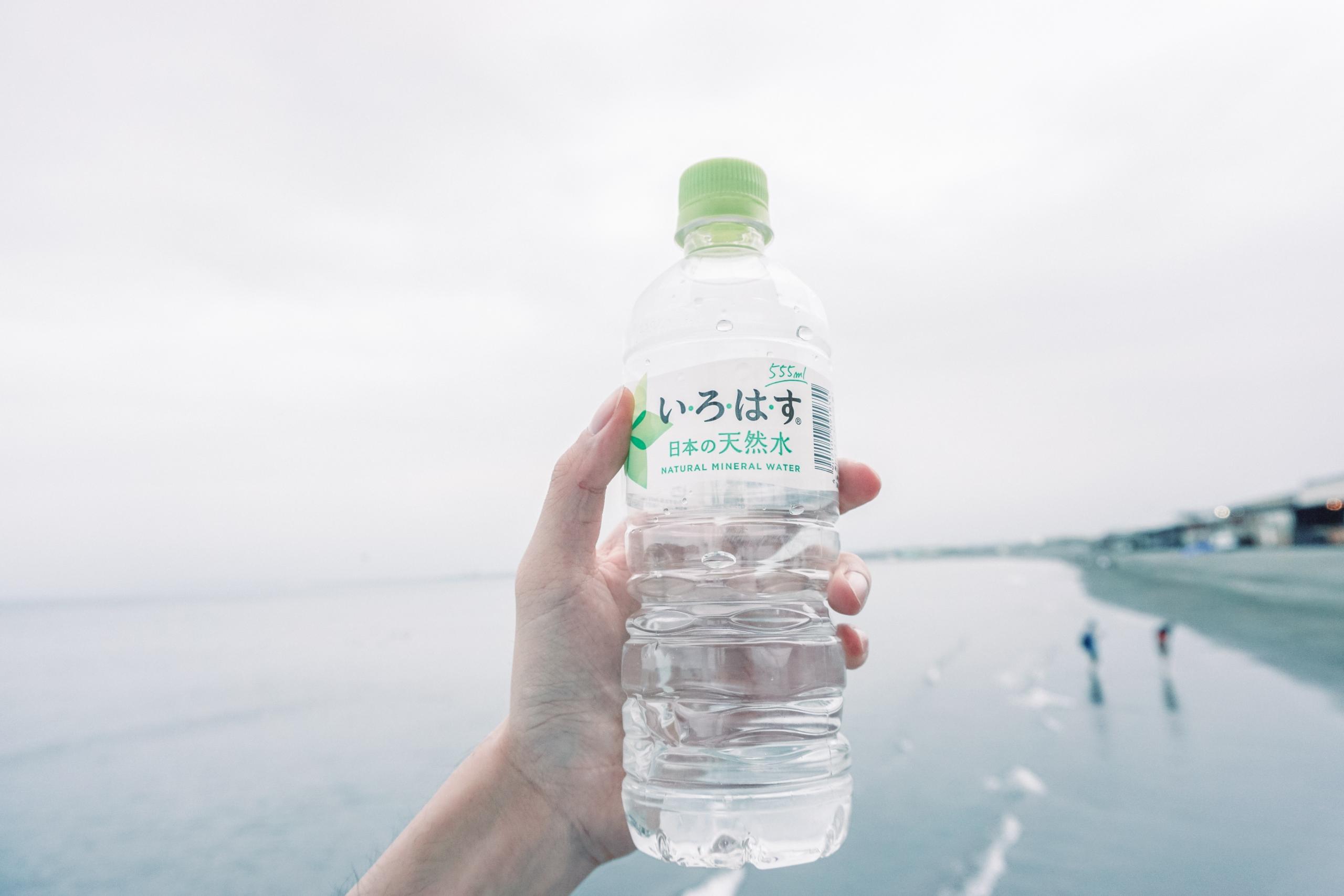Bottle of water being held during a run