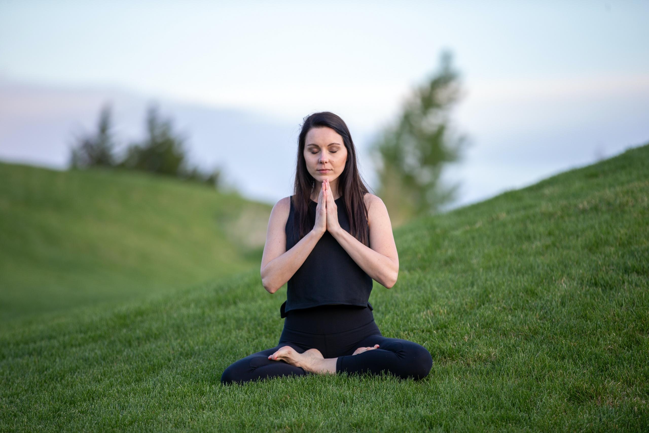 Woman practicing outdoor yoga
