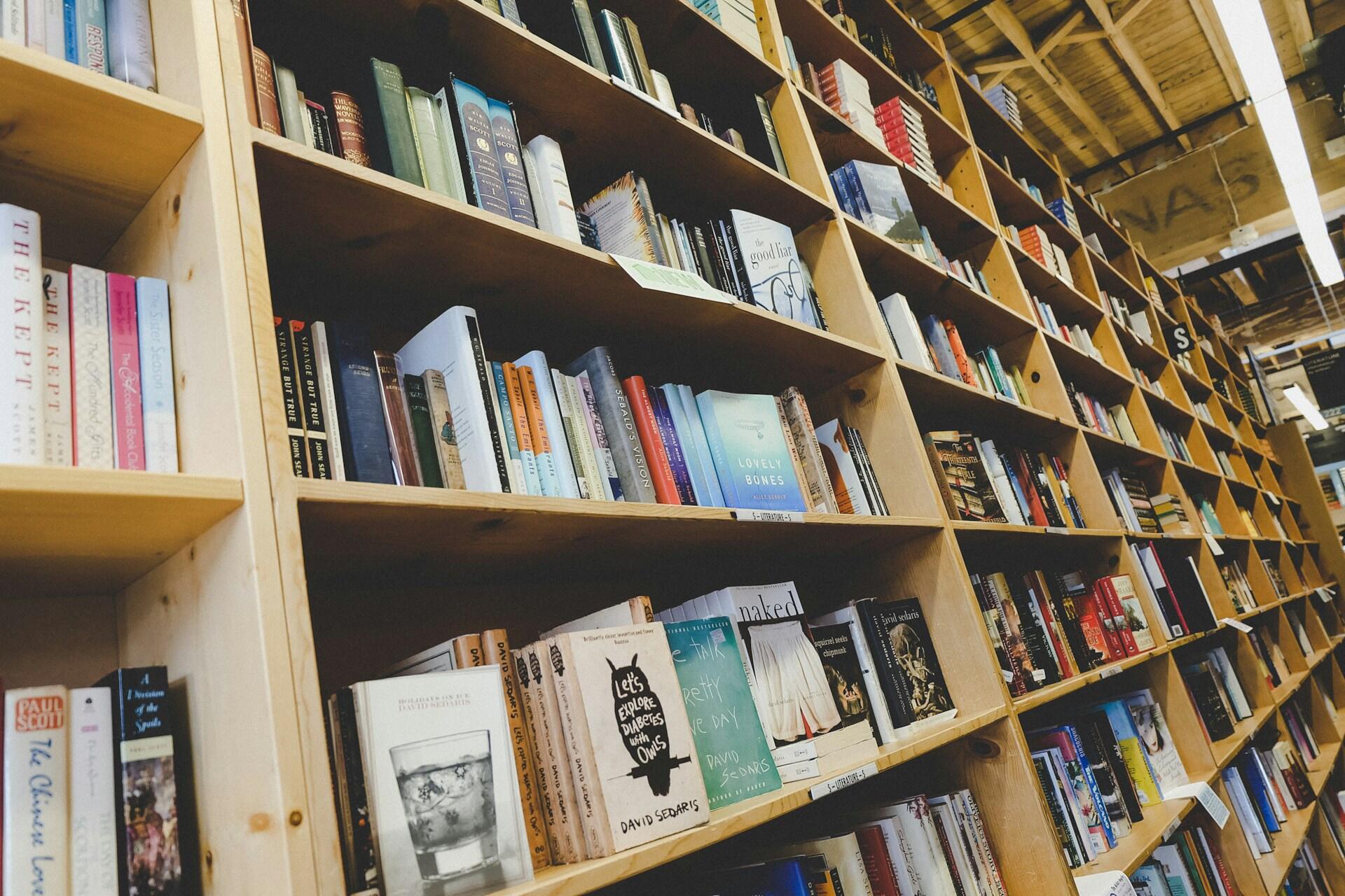 Books on a shelf in a library.