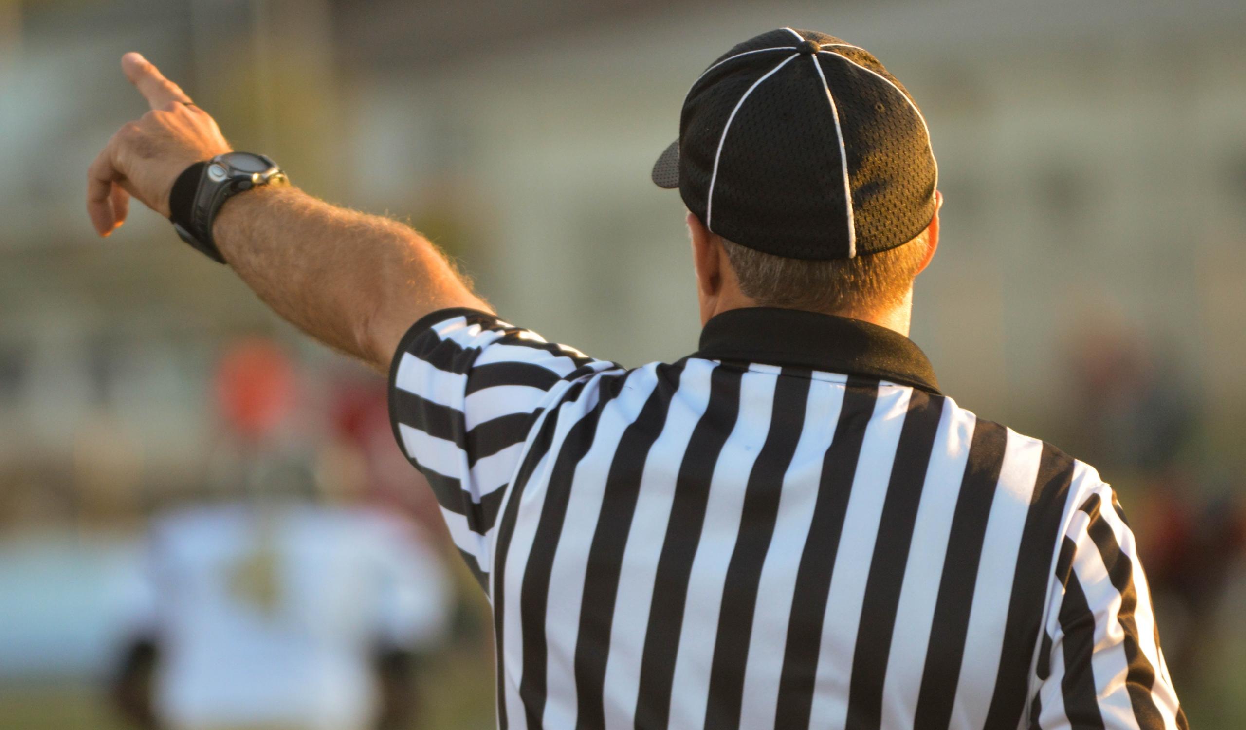 Referee making a decision