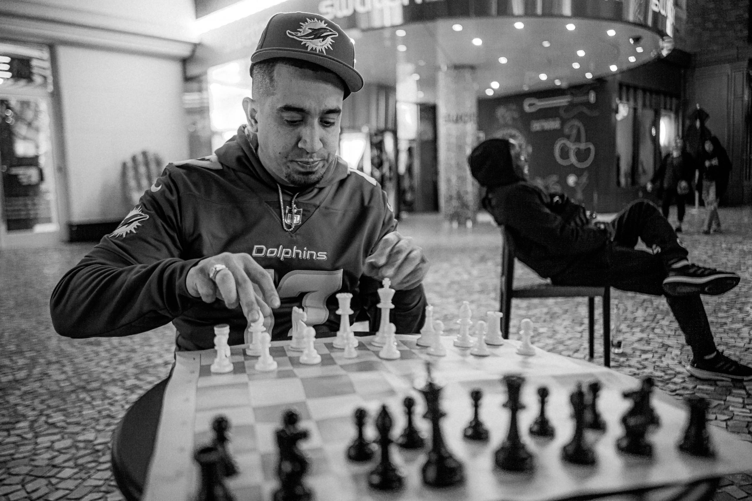 chess player considering chess tactics