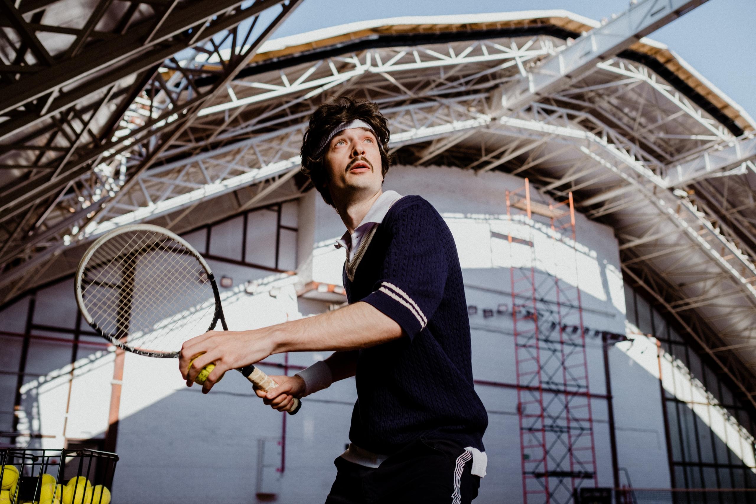 Tennis player holding racket