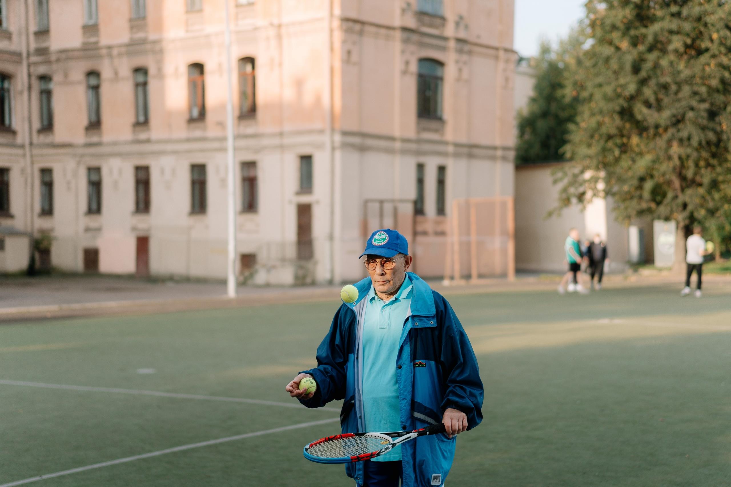 Tennis coach giving a tennis coaching session
