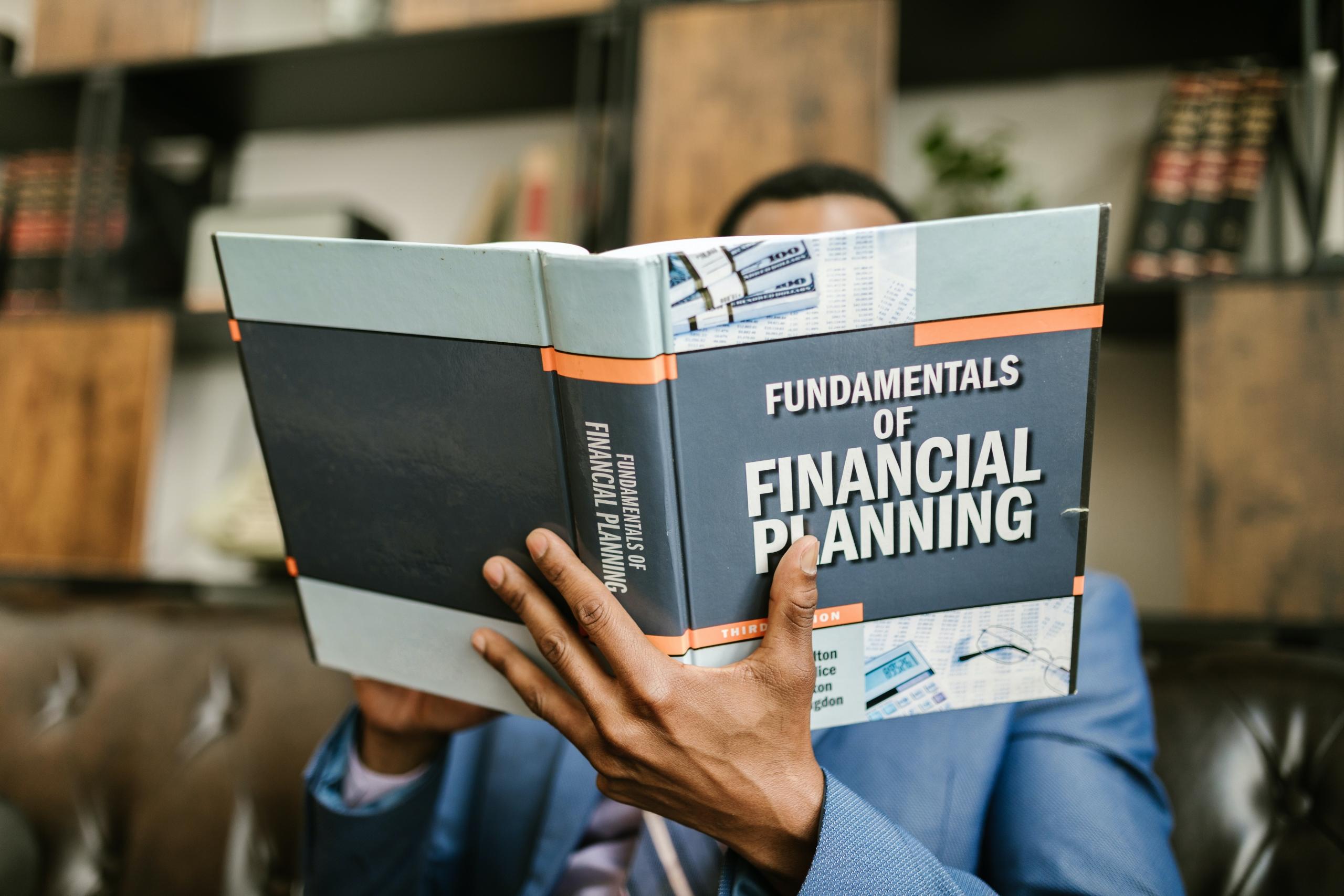 Reading a book on financial planning