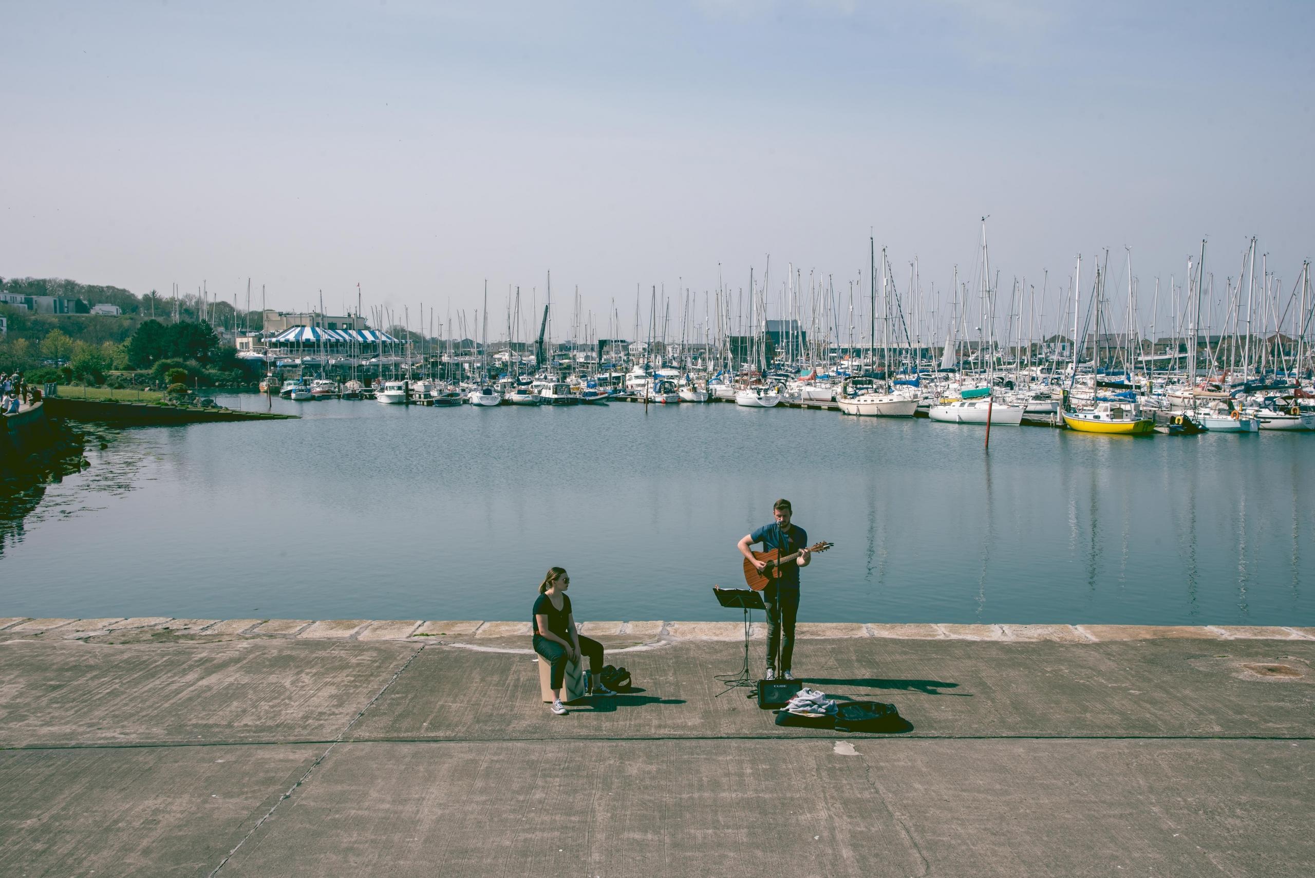 Irish musicians busking