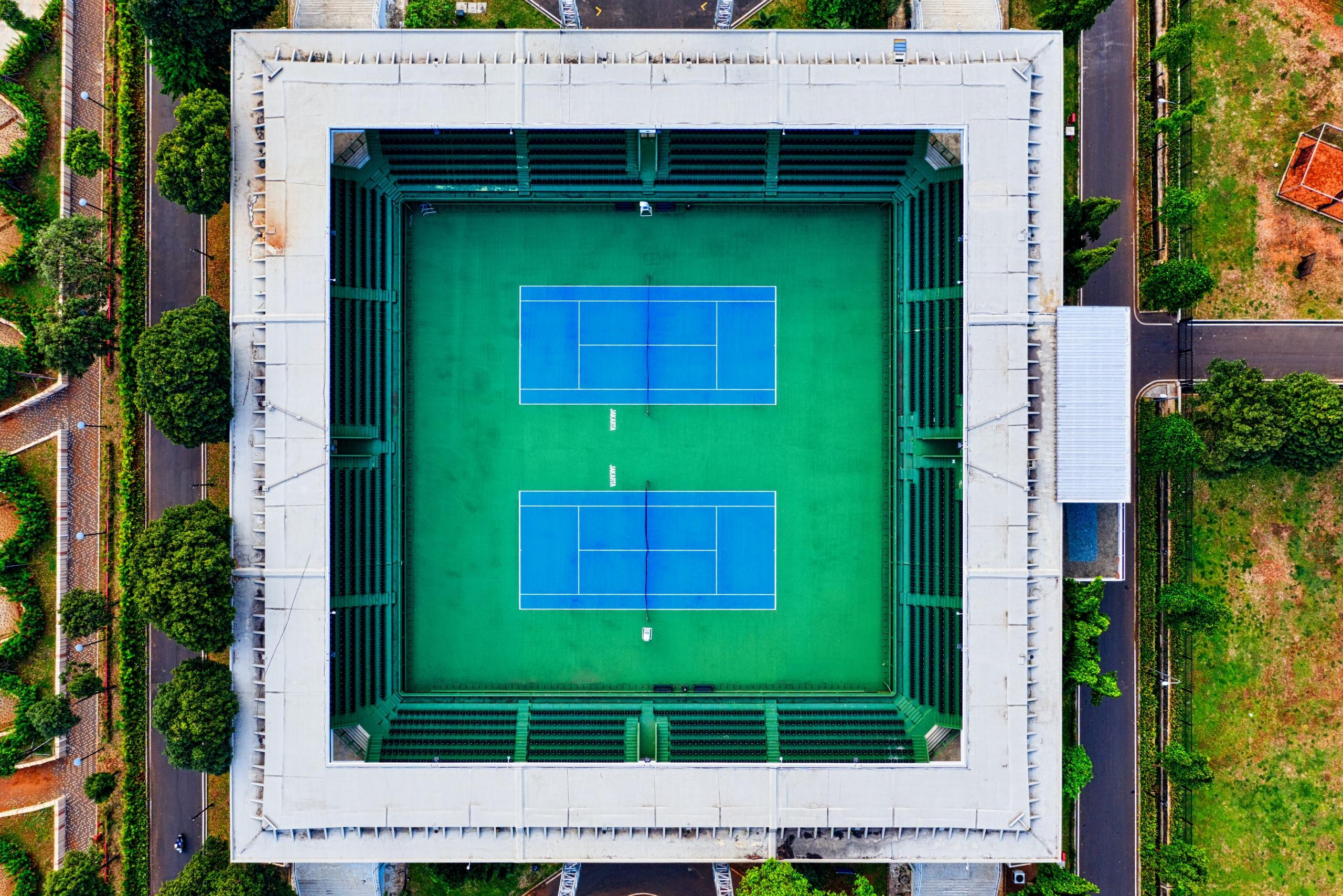 An overhead shot of an empty tennis court