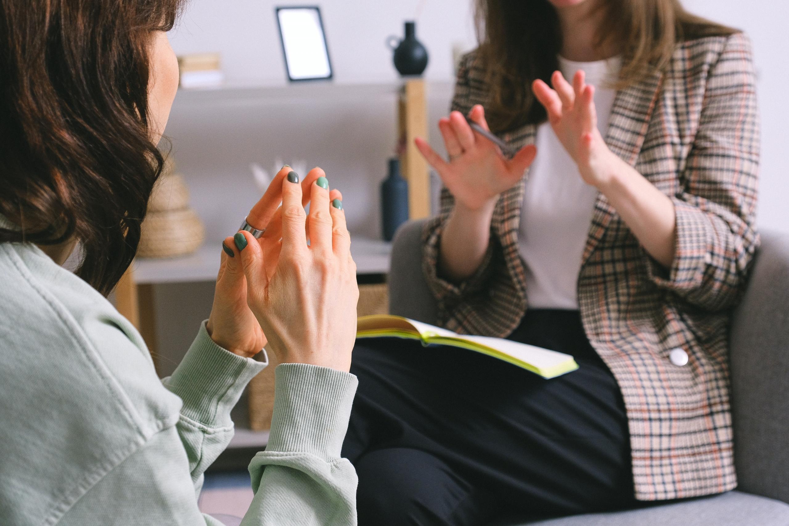 Supportive therapist helping a patient embark on a journey of personal growth.