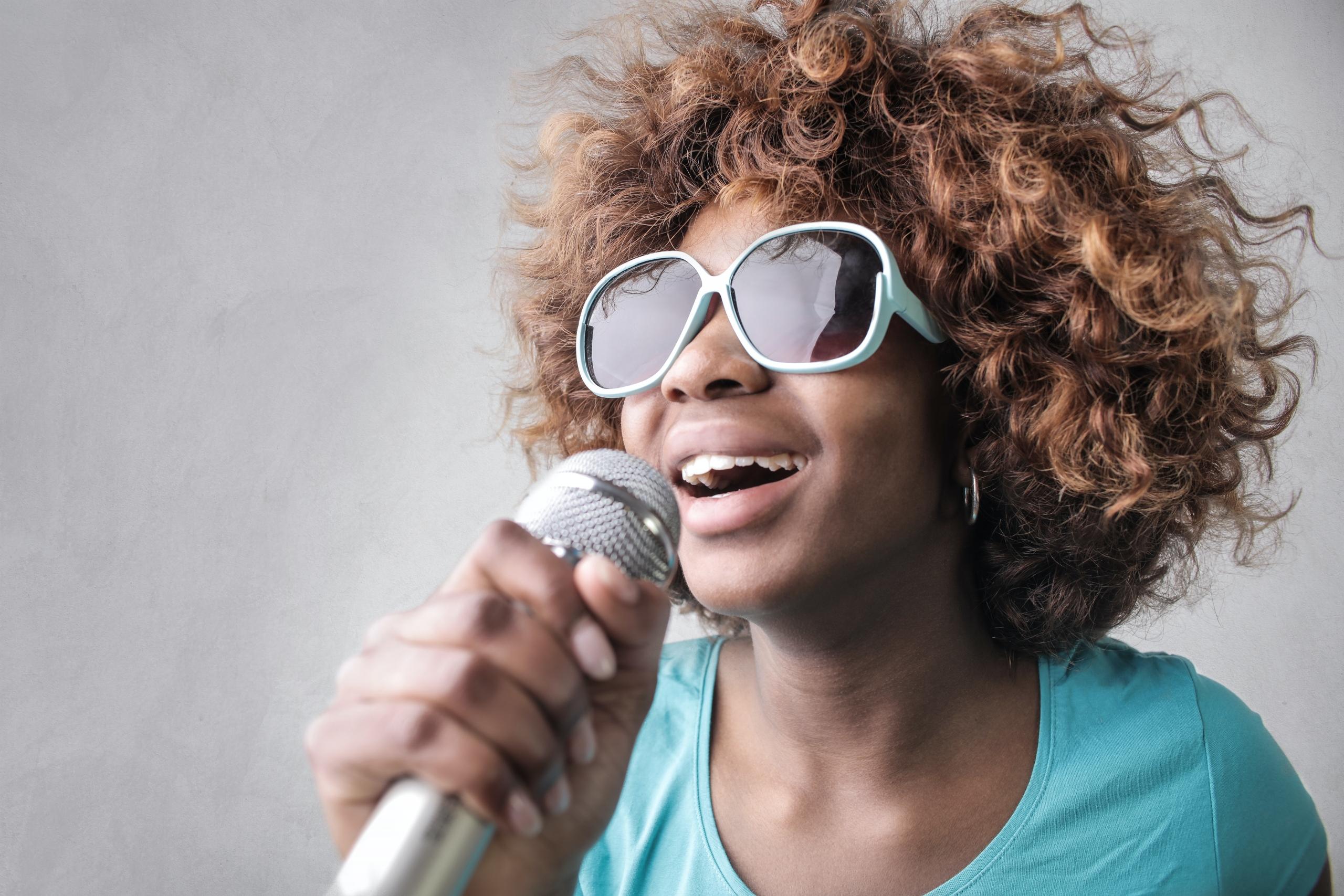 Captured moment of a singer's soulful expression.
