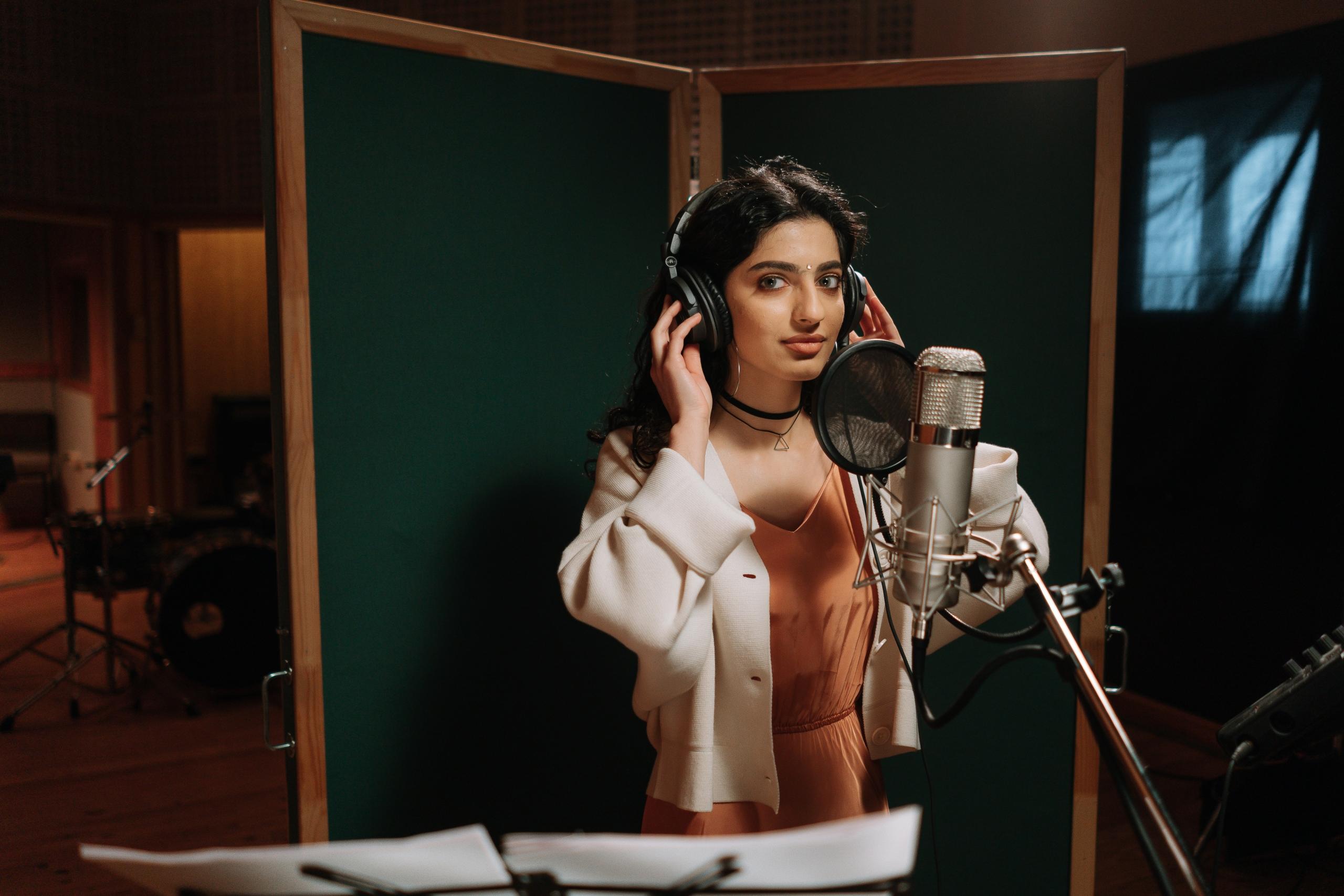Singer evoking deep emotions through song.