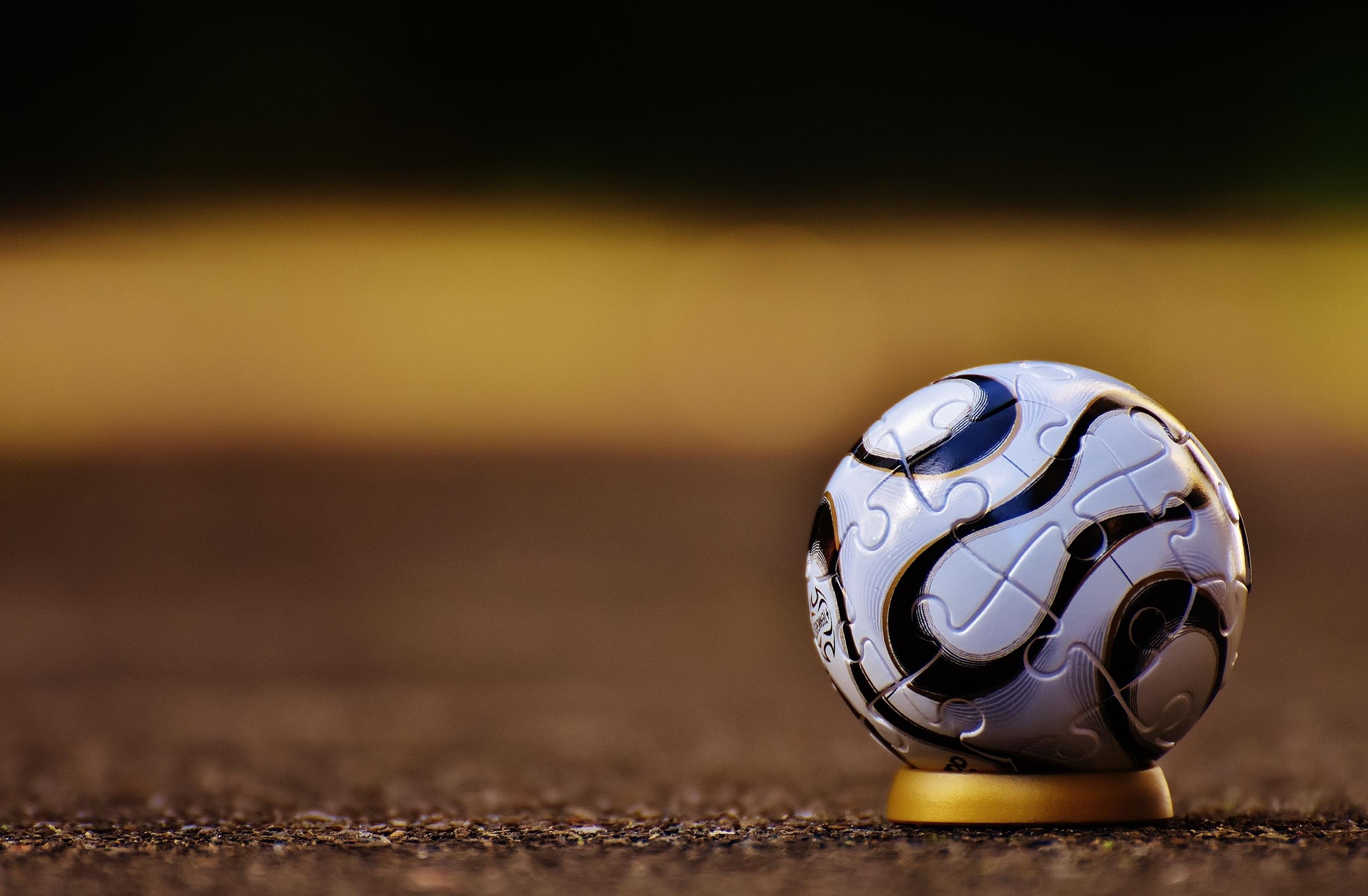 A football ready for kick off.