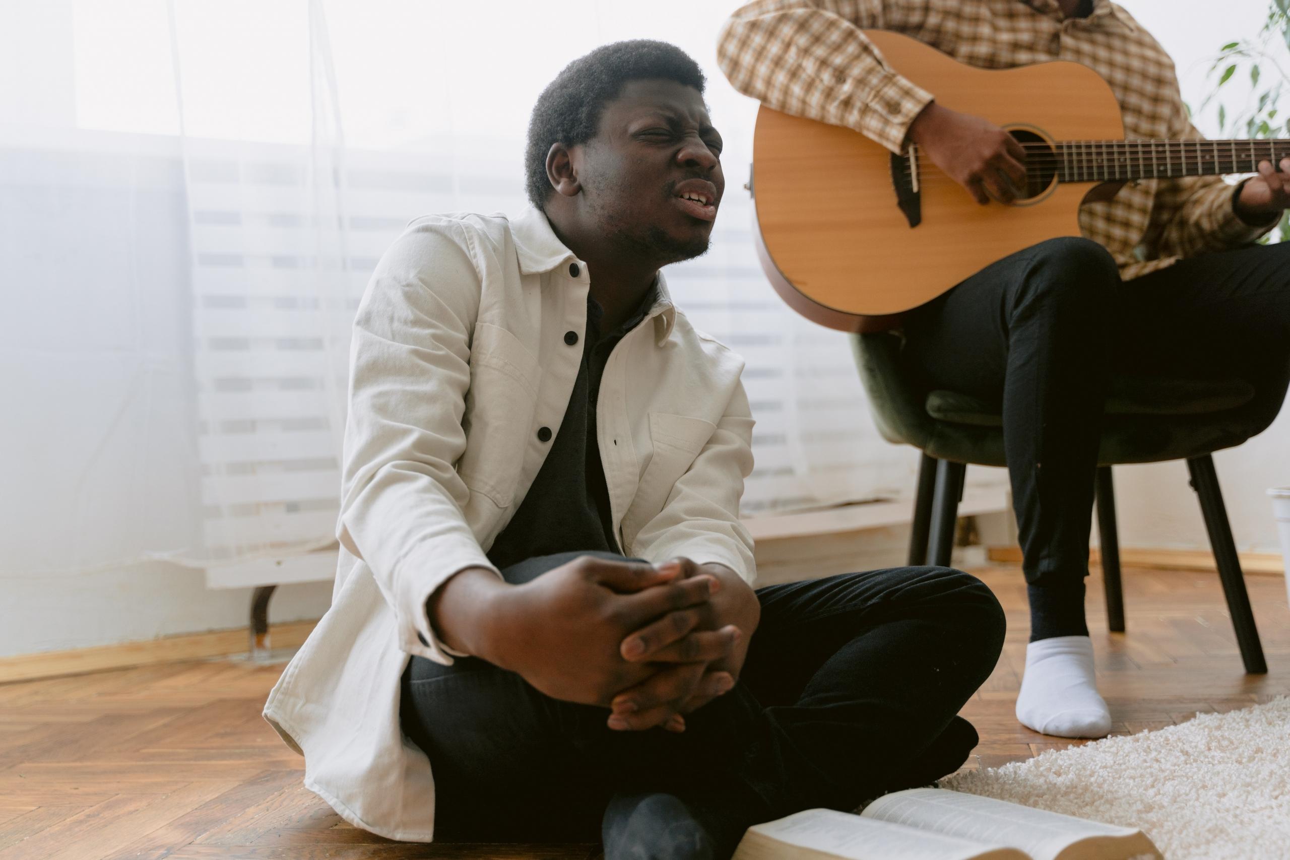 A vocalist lost in the music.