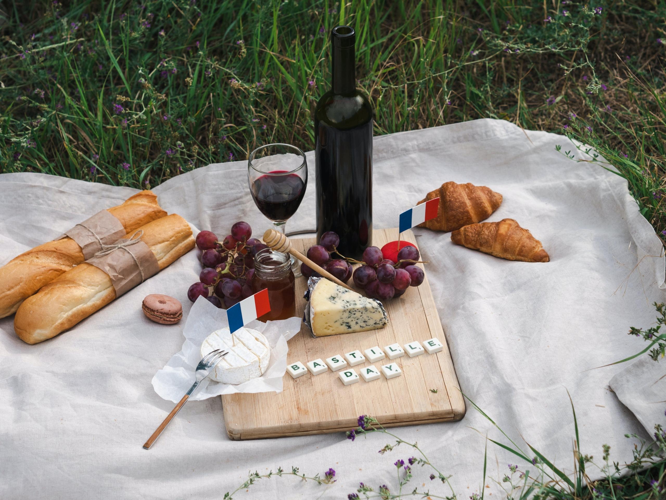 A spread of french pastries and cheese.