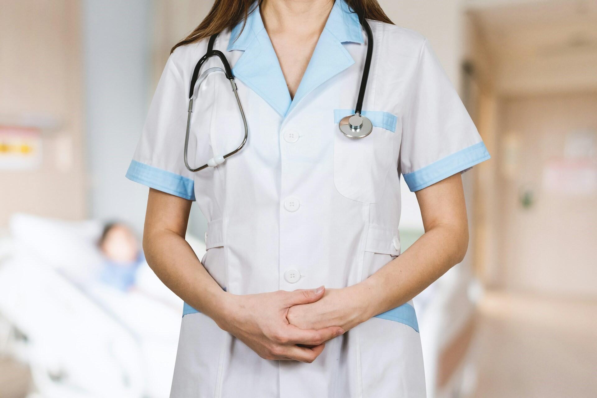 A nurse in scrubs.