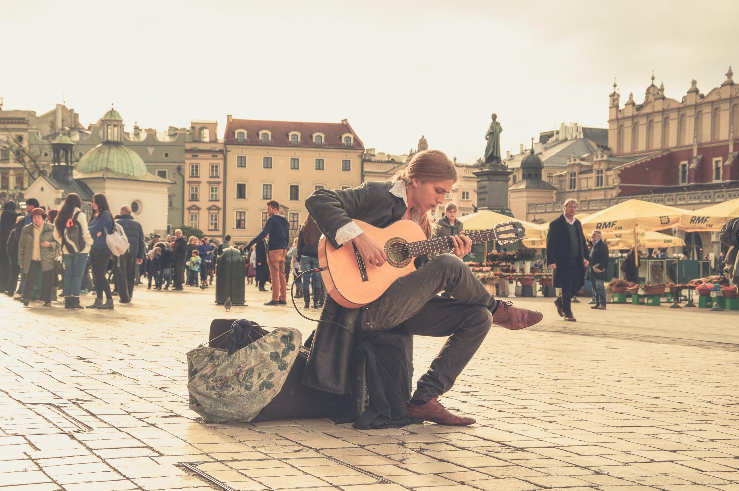 Playing guitar in the streets